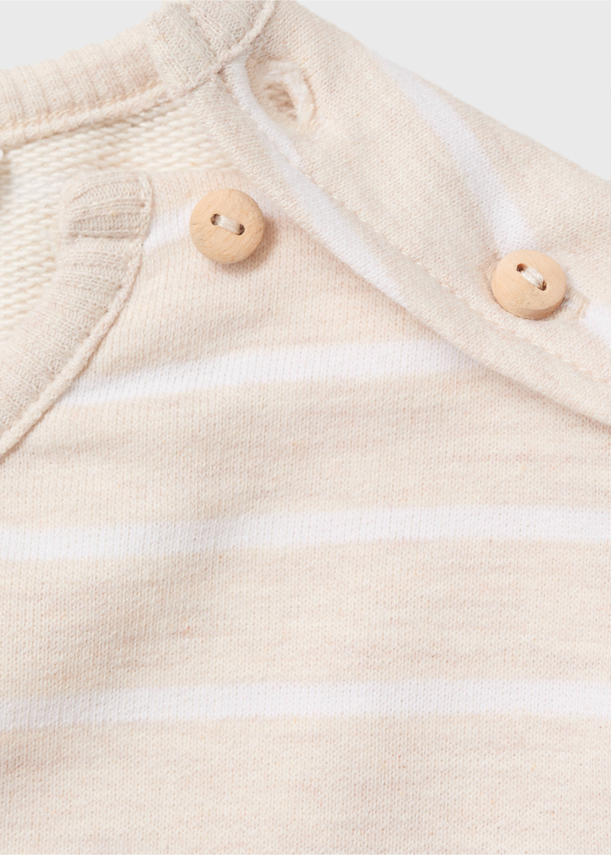 Striped sweatshirt with button detail - Details of the article 8, Sand. Ref: 17044077-00.