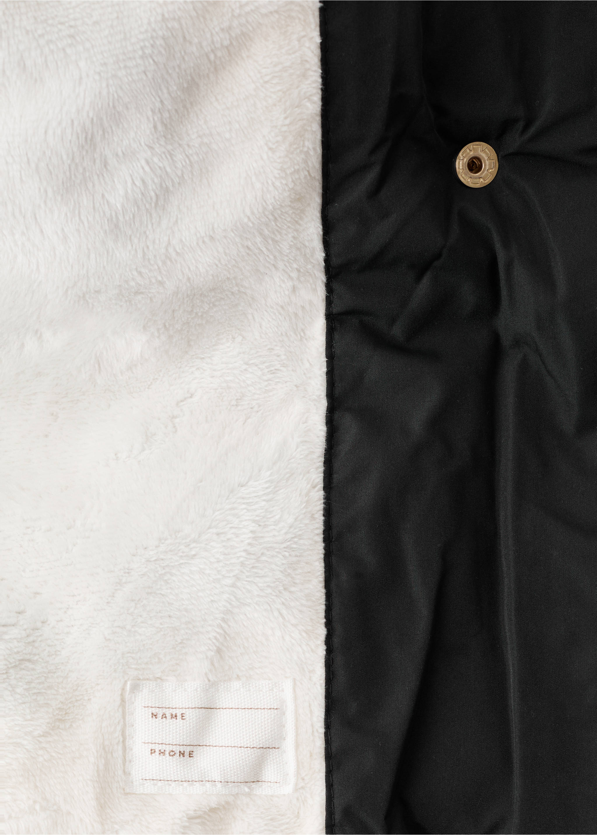 Long anorak with fur-effect lining - Details of the article 0, Black. Ref: 17044407-00.