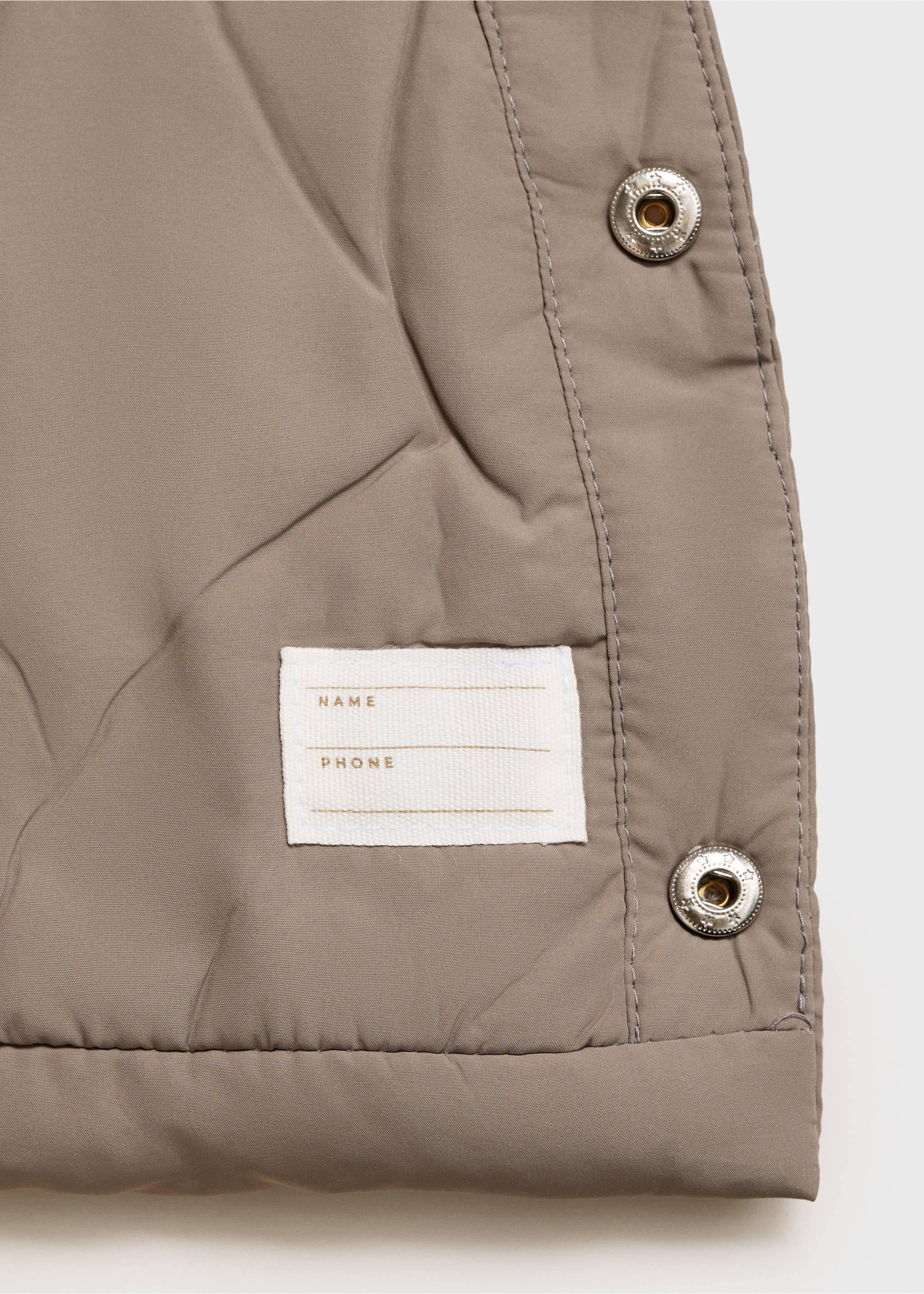 Quilted coat with ear flaps - Details of the article 0, Medium Brown. Ref: 17044773-00.