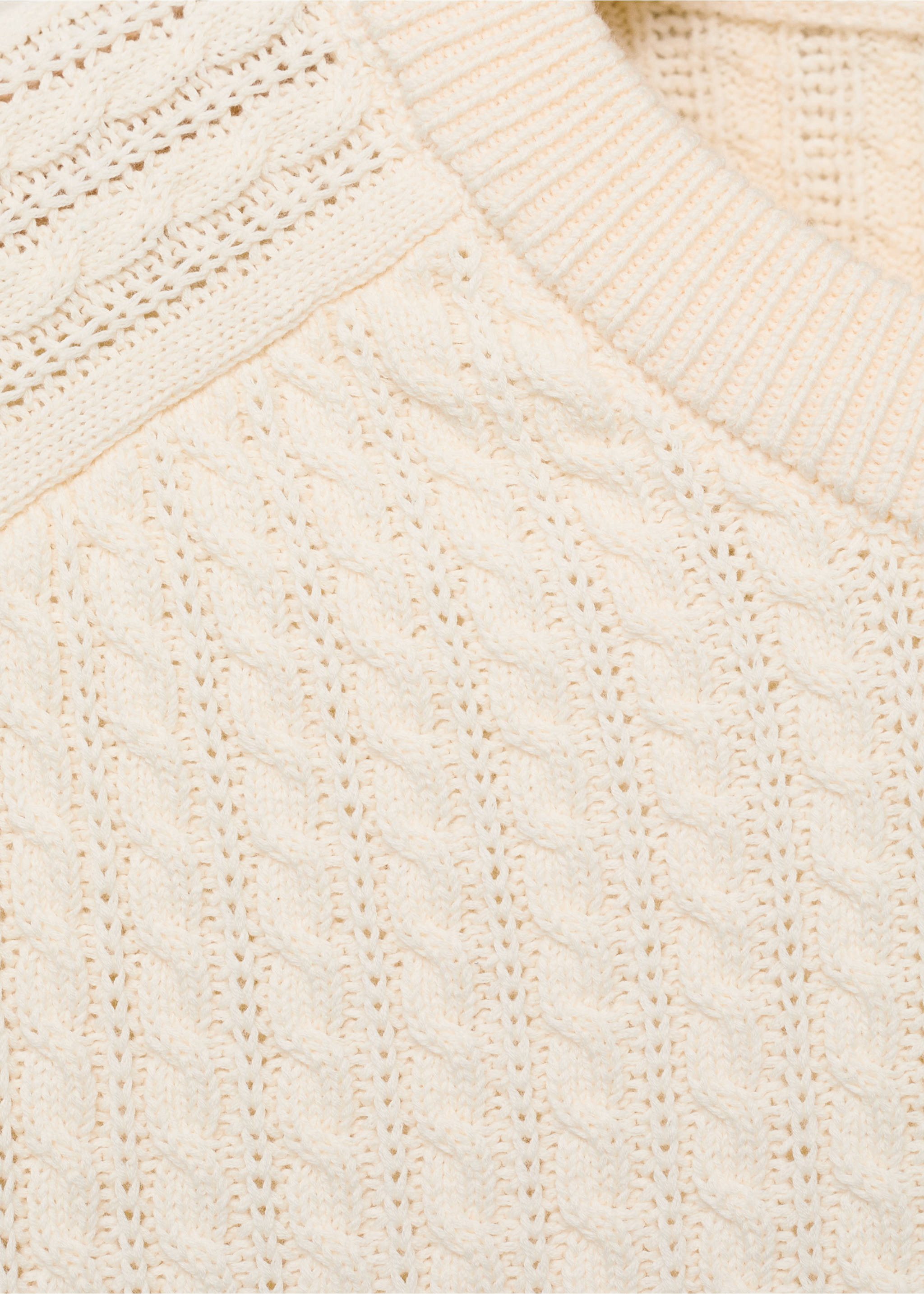 Close-up of an off-white cable-knit jumper with a ribbed crew neck., Off White. Ref: 17045150-00.