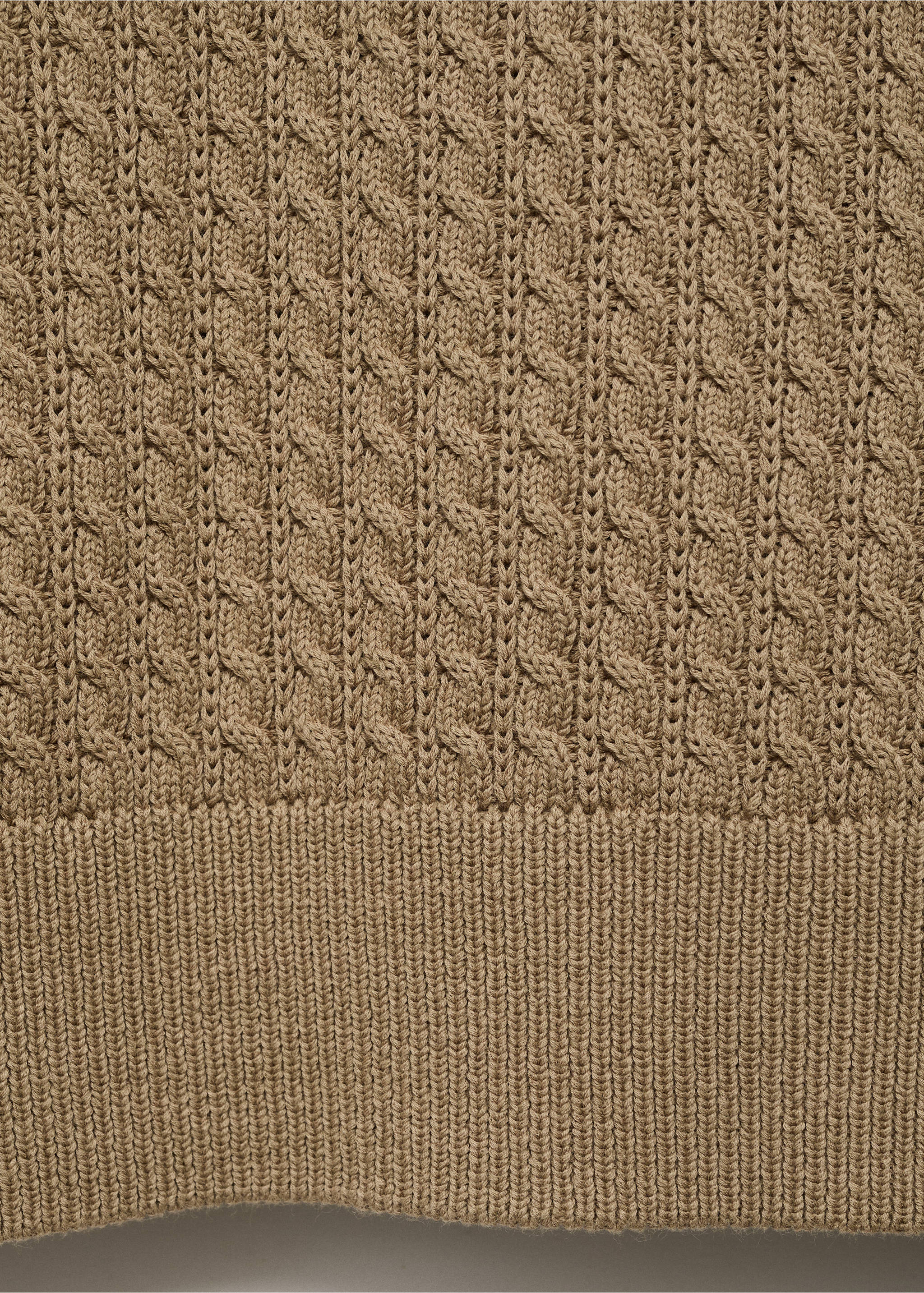 Brown cable-knit jersey fabric detail showing the textured pattern and ribbed hem., Sand. Ref: 17045150-00.