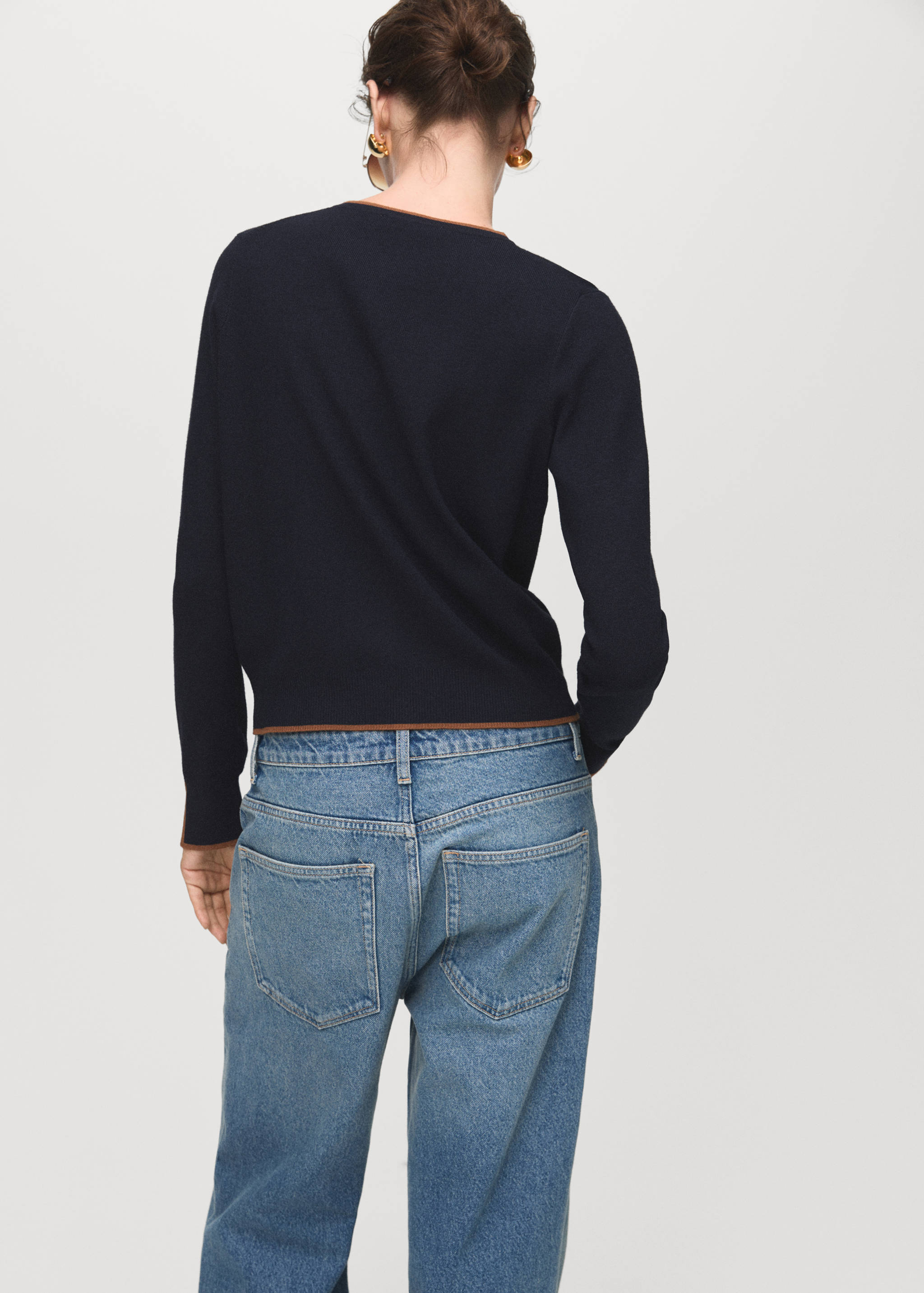 Cardigan with cuff opening - Reverse of the article