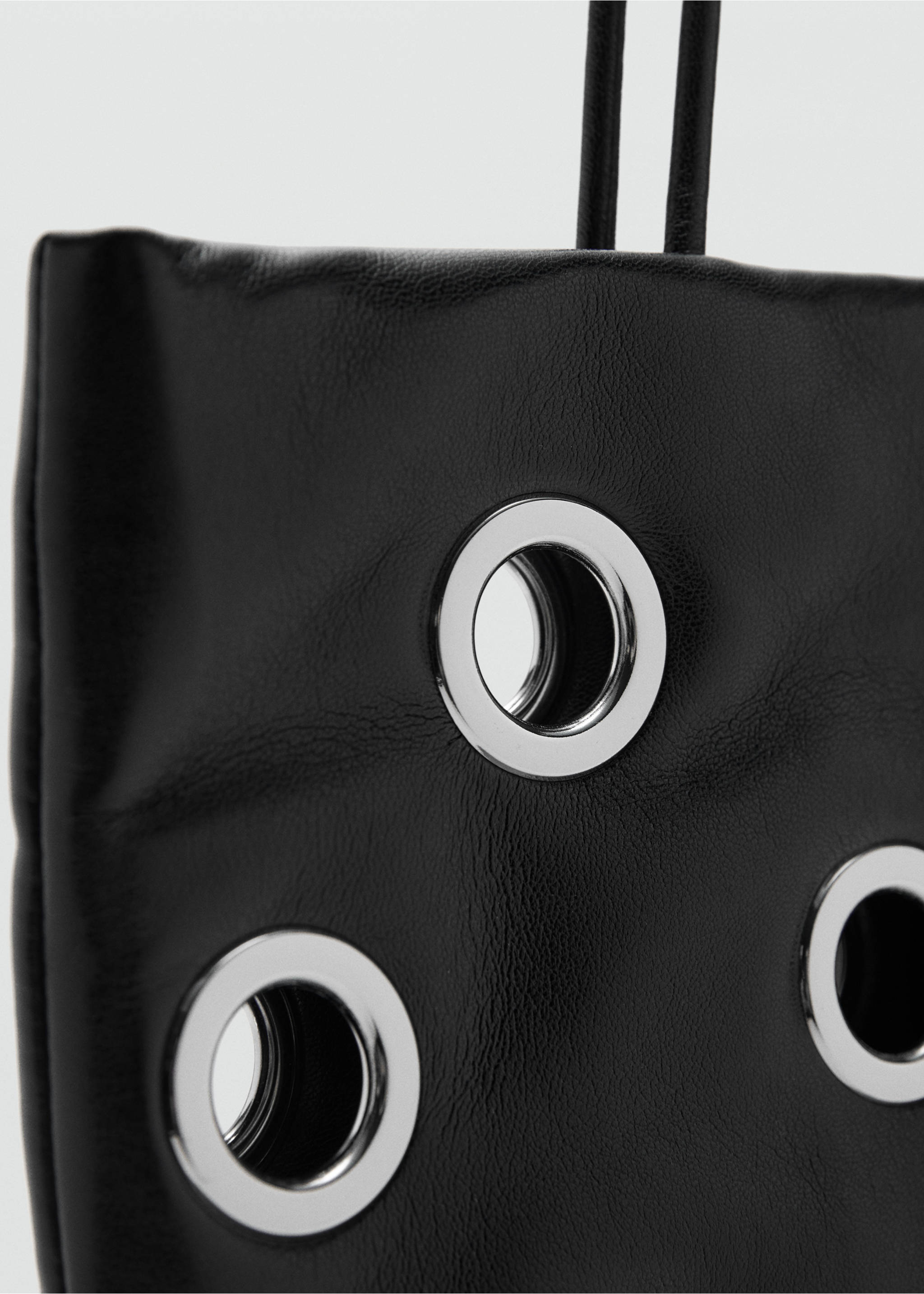 Shoulder bag with eyelets - Details of the article 1, Black. Ref: 17046740-00.