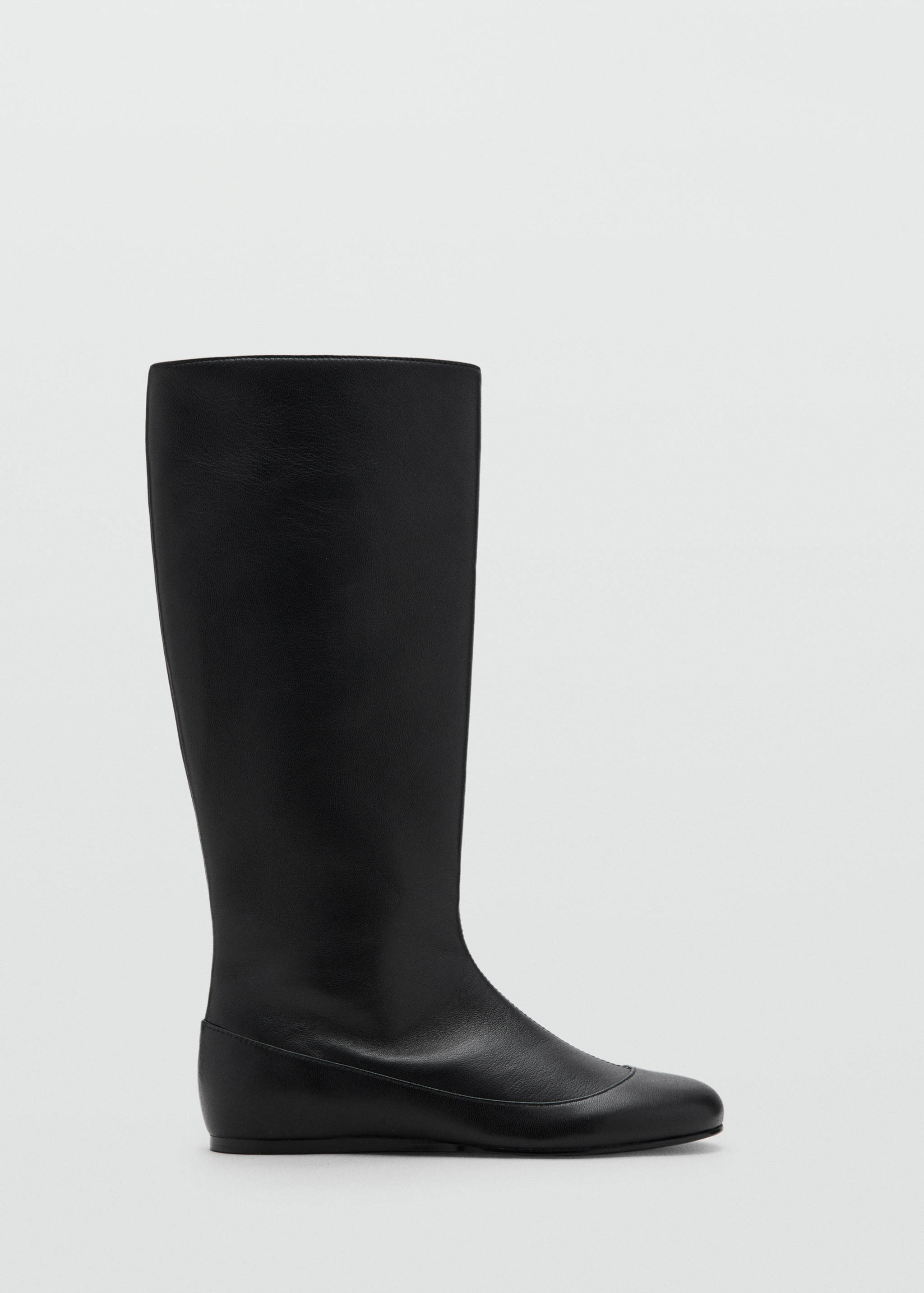 Black flat knee-high boot with a rounded toe and piped seam.