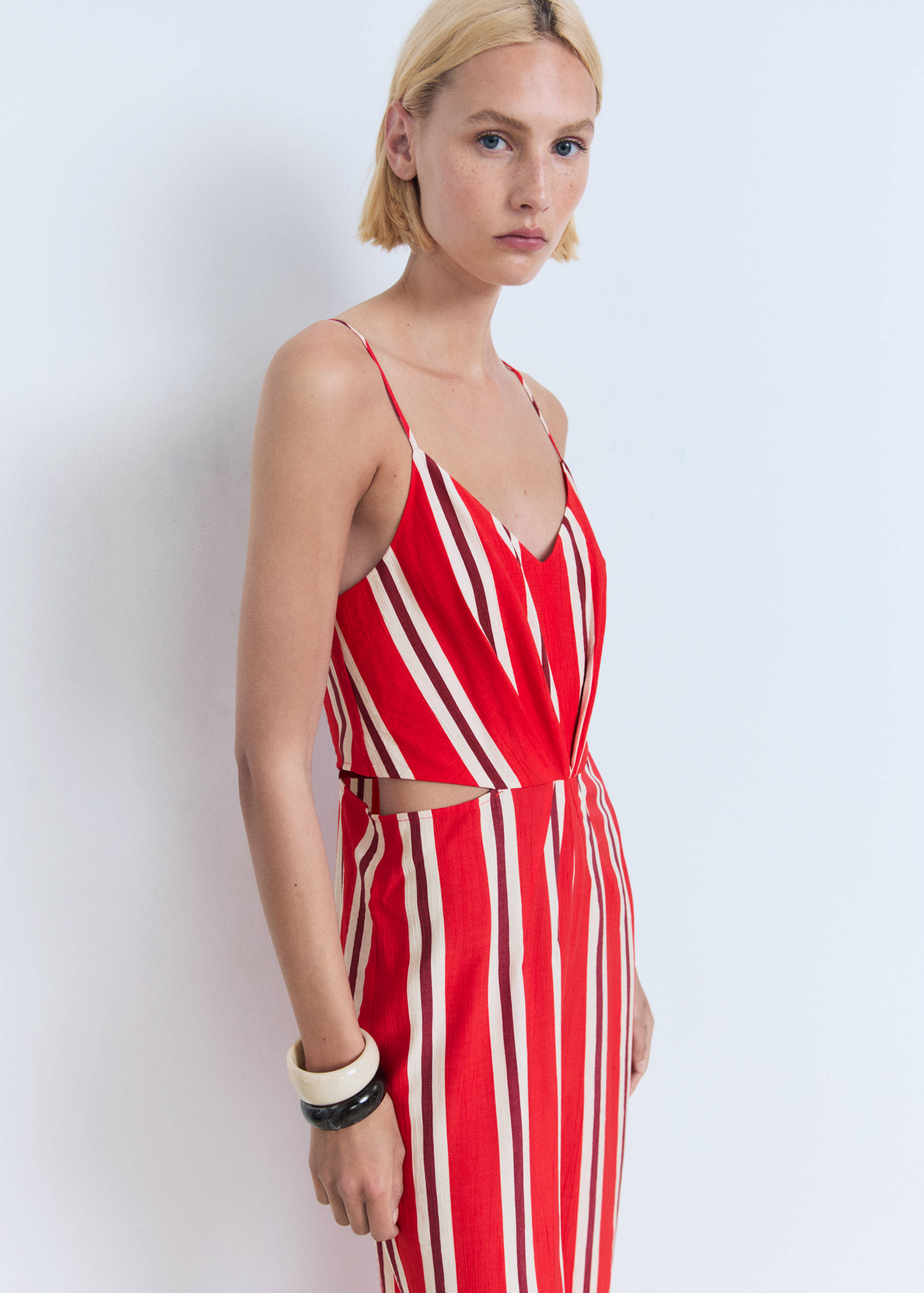 Striped jumpsuit with cut-out - Medium plane