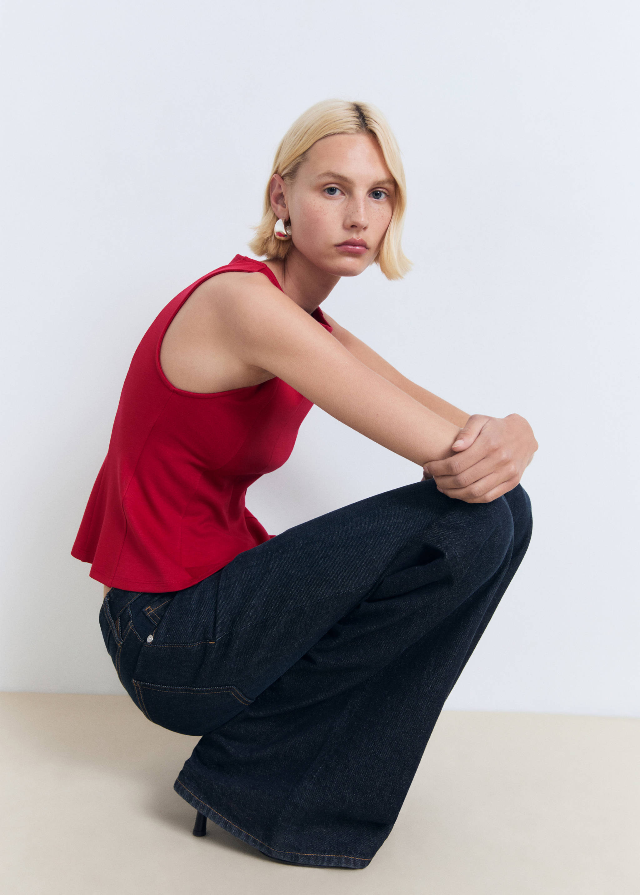 Peplum top with seam detail - Details of the article 2