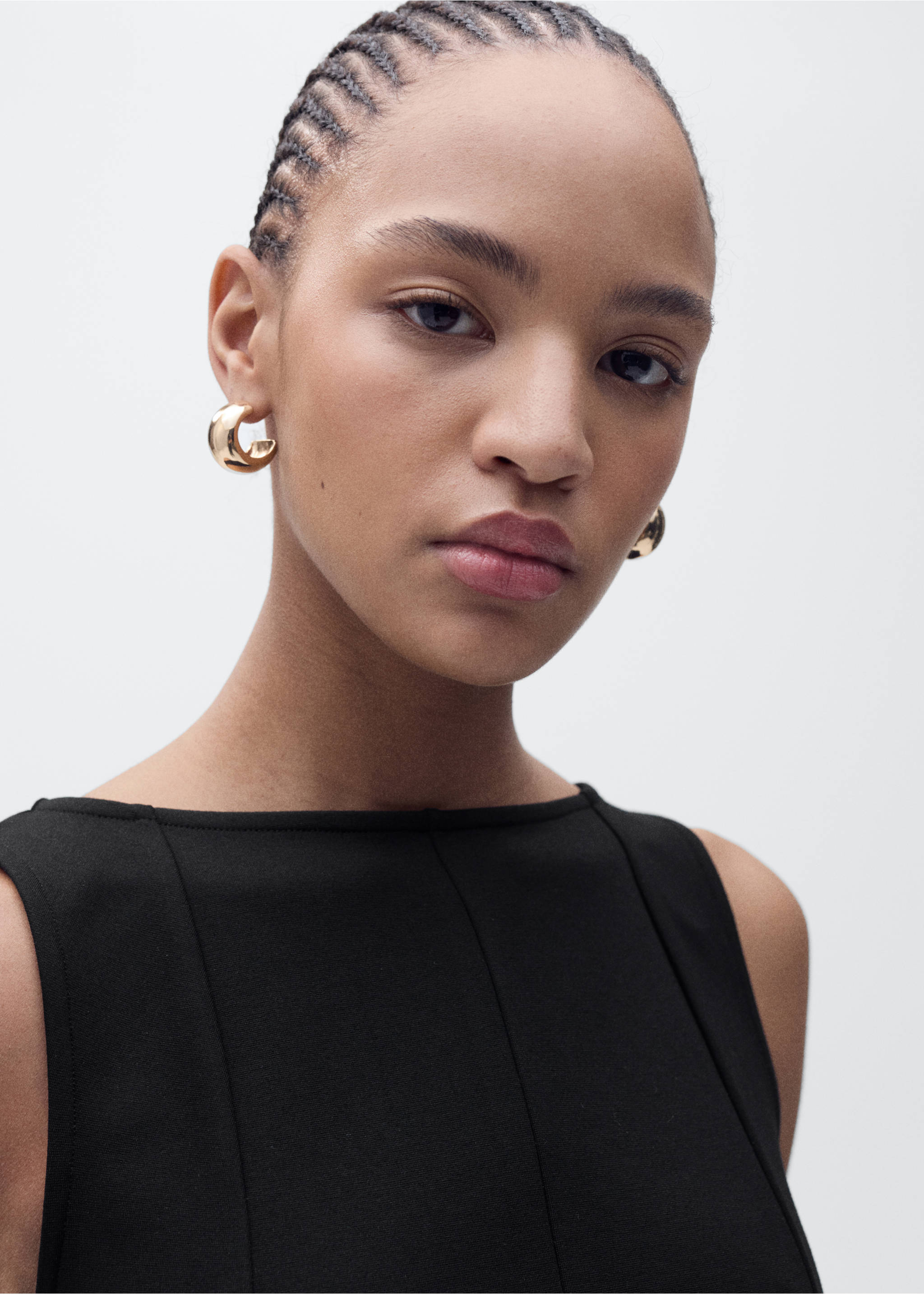 Peplum top with seam detail - Details of the article 1, Black. Ref: 17051268-00.