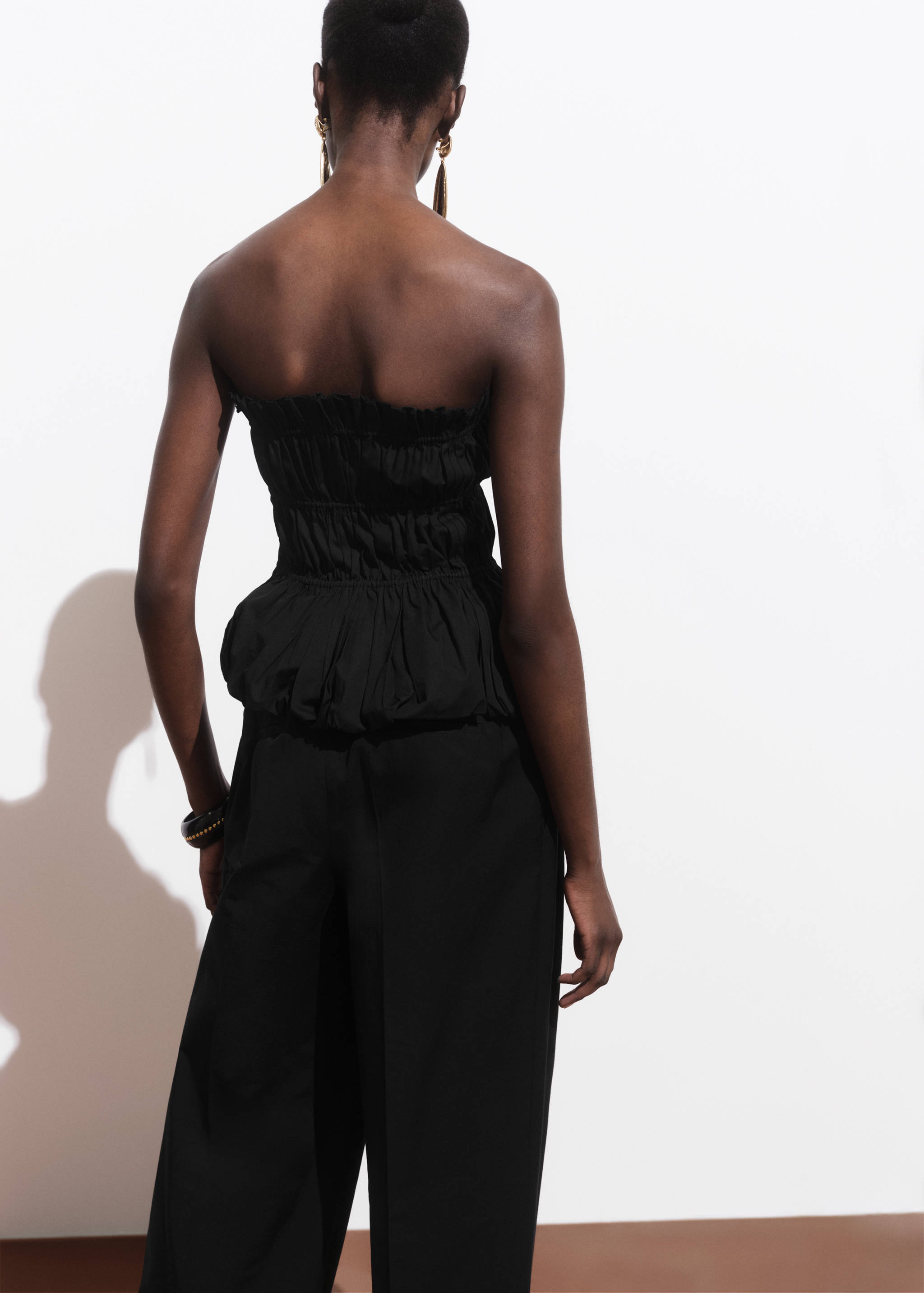 Ruched strapless top - Reverse of the article