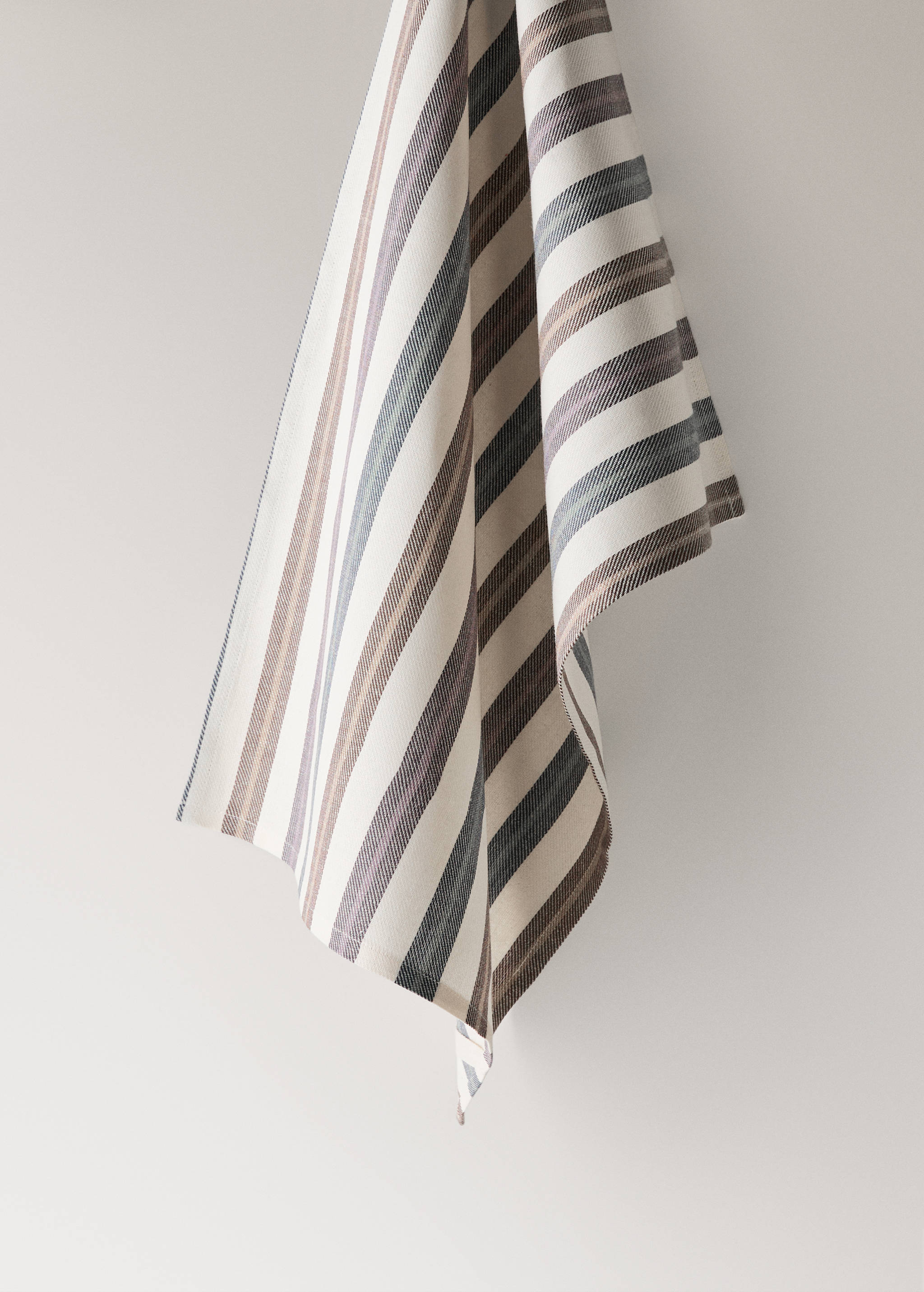 Striped kitchen towel in blue, brown, and off-white.
