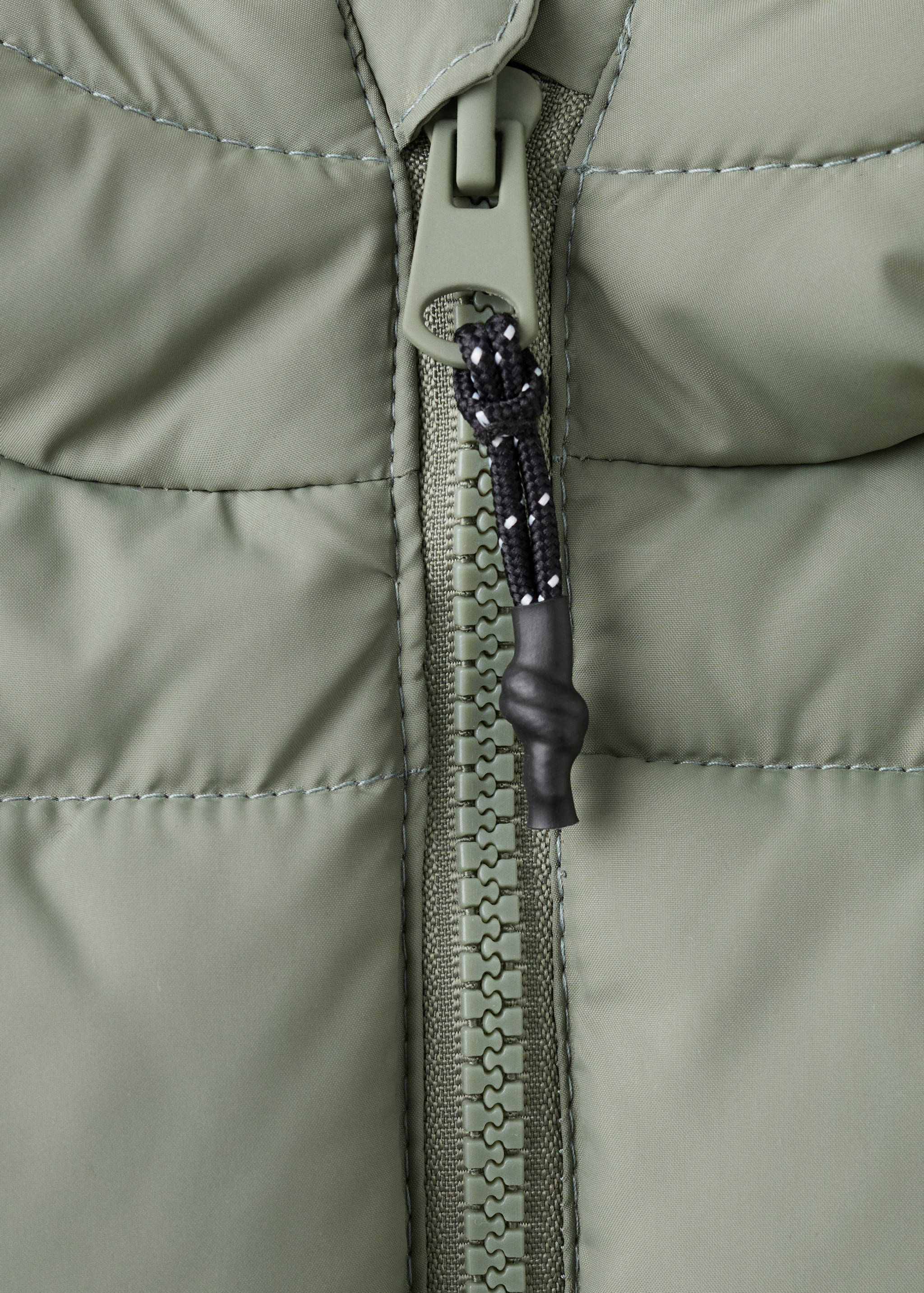 Lange gewatteerde anorak met capuchon - Detail van het artikel 8