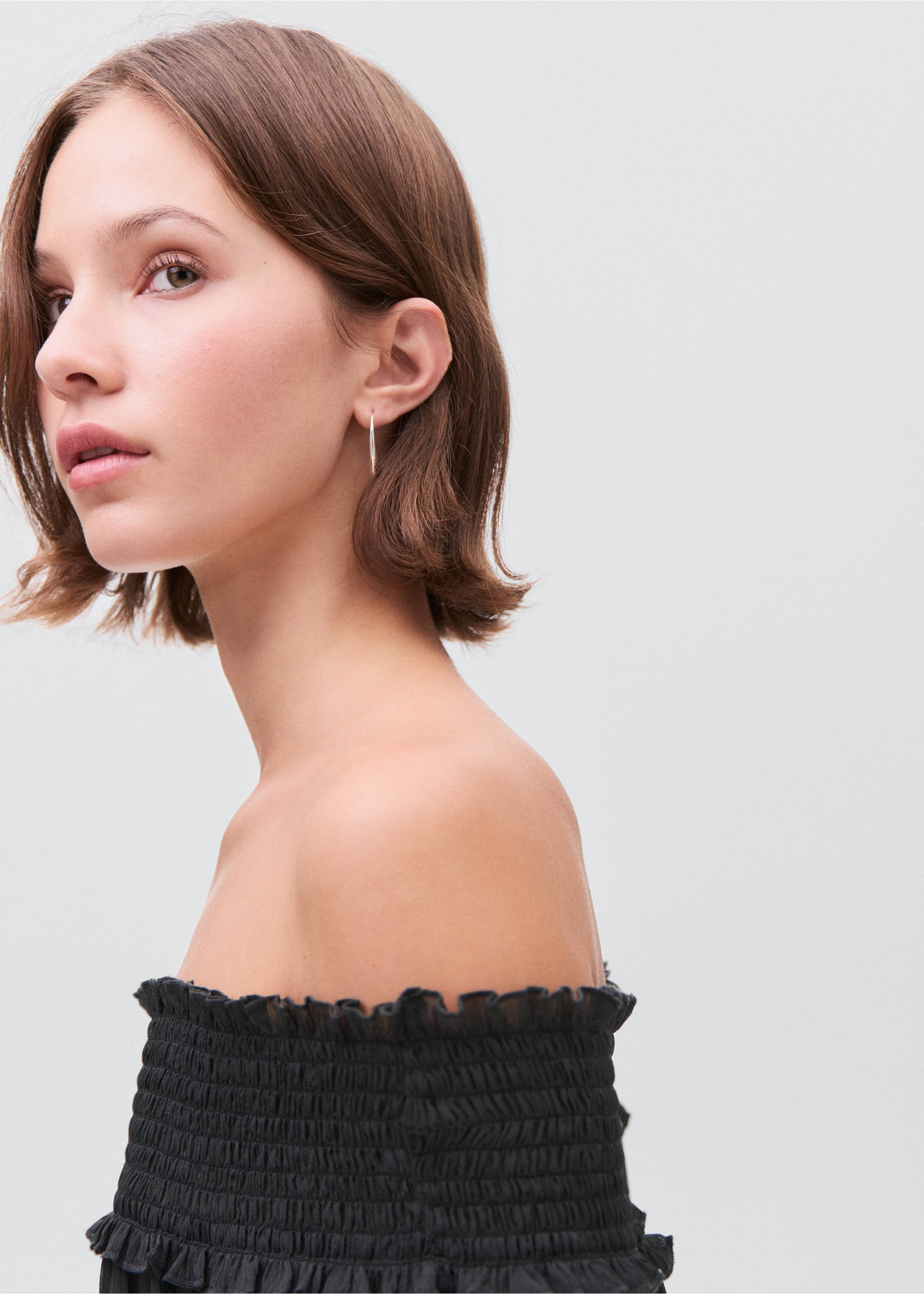 Strapless blouse with ruffled panel - Details of the article 1, Charcoal. Ref: 17054078-00.