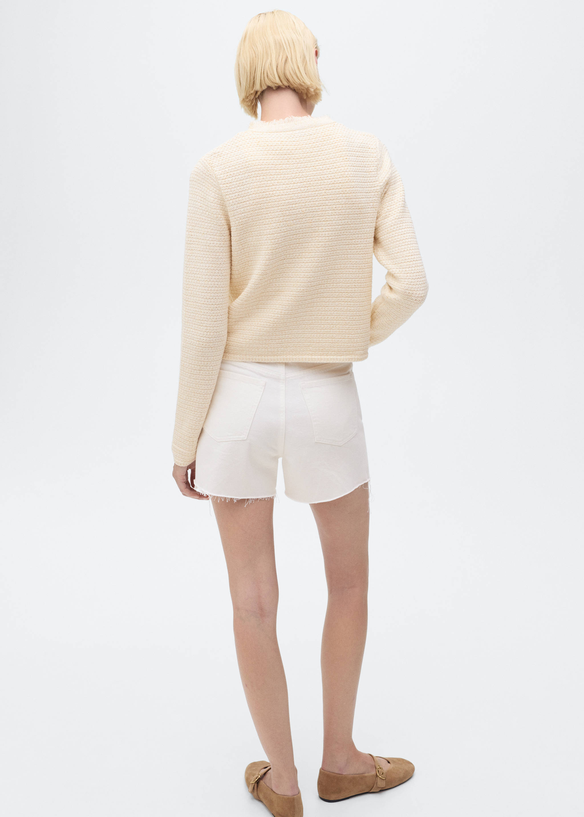 Knitted cardigan with frayed ends - Reverse of the article