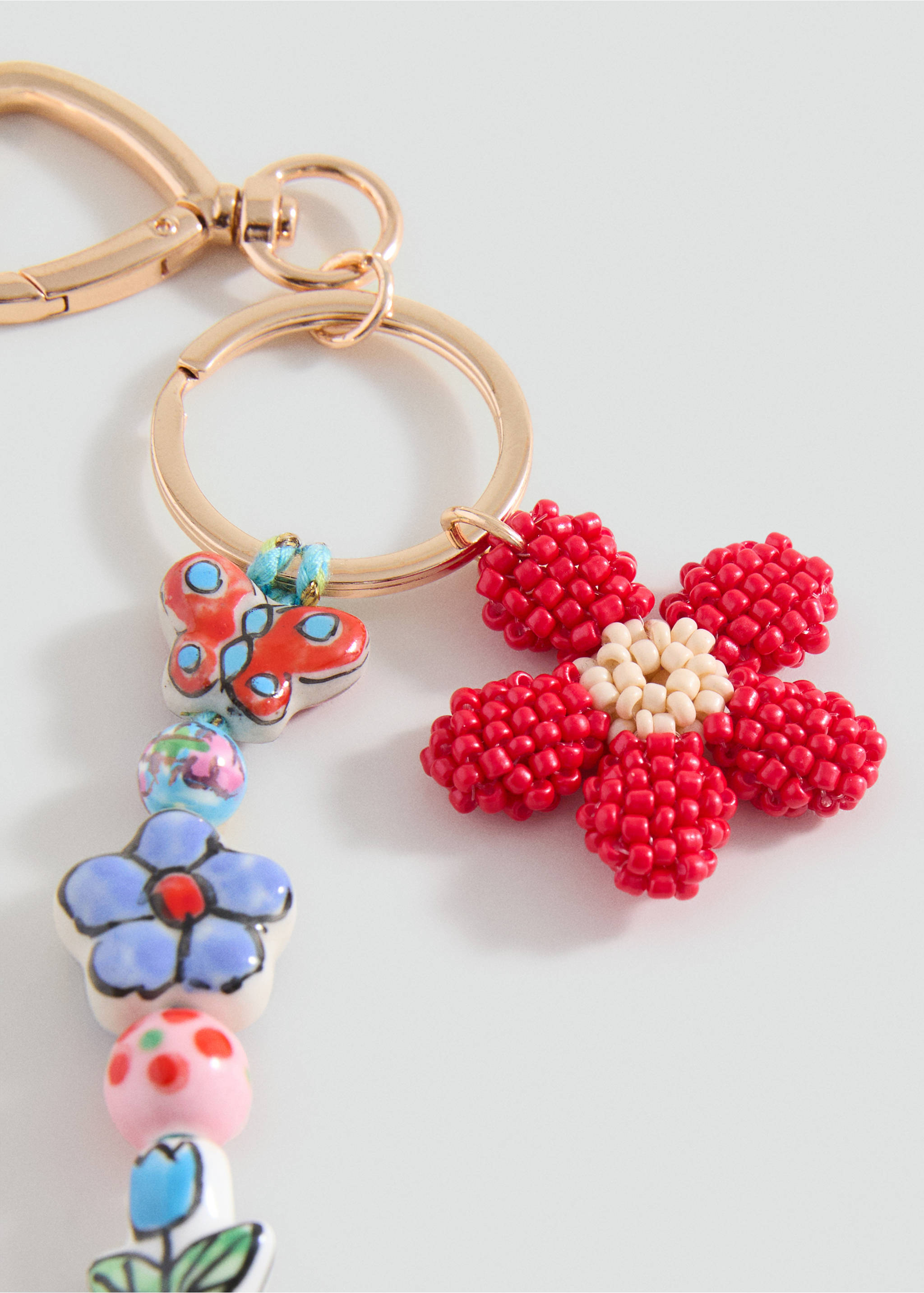 Flower keychain - Details of the article 1, Sky Blue. Ref: 17054116-00.