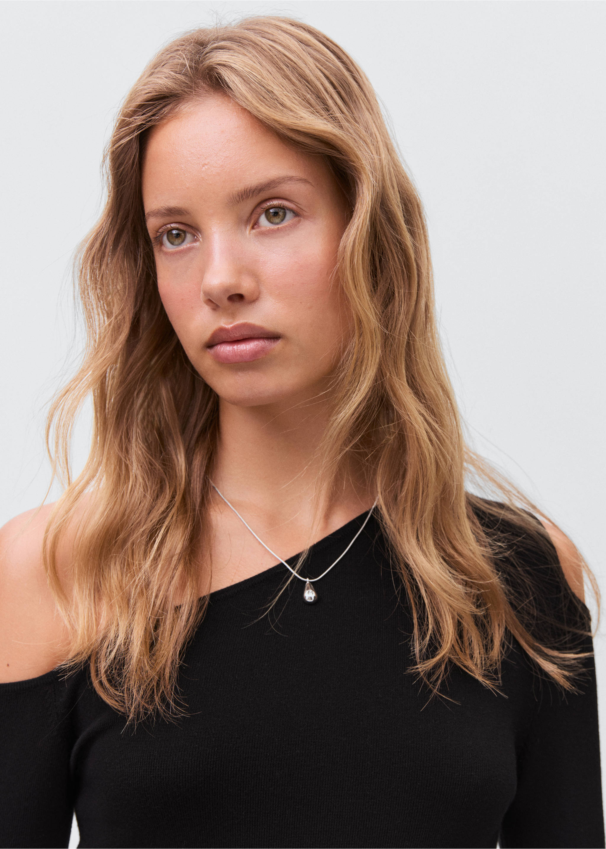 Asymmetrical dress with cut-out - Details of the article 1, Black. Ref: 17054777-00.