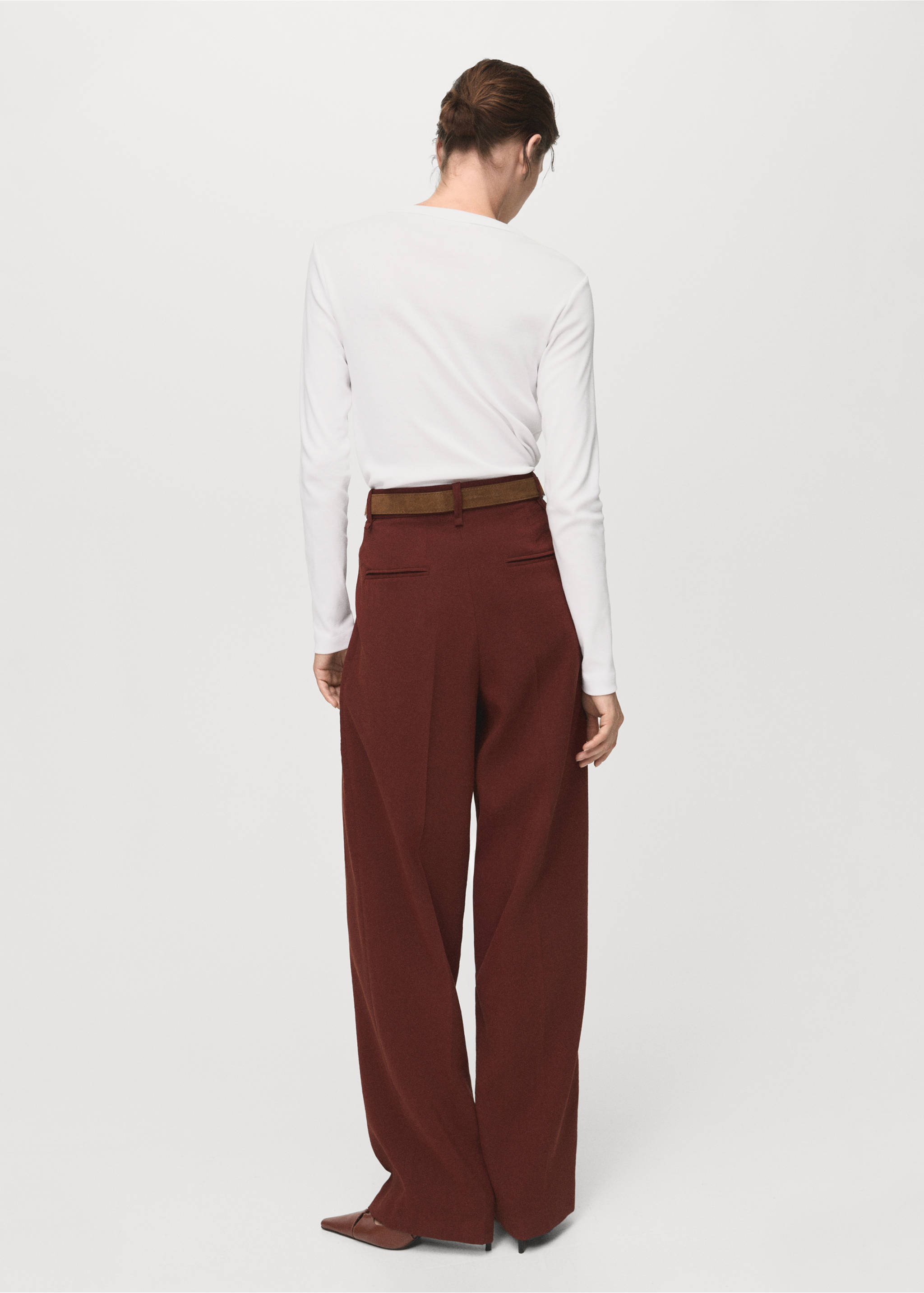 White long-sleeved t-shirt seen from the back, paired with brown trousers., White. Ref: 17055814-00.