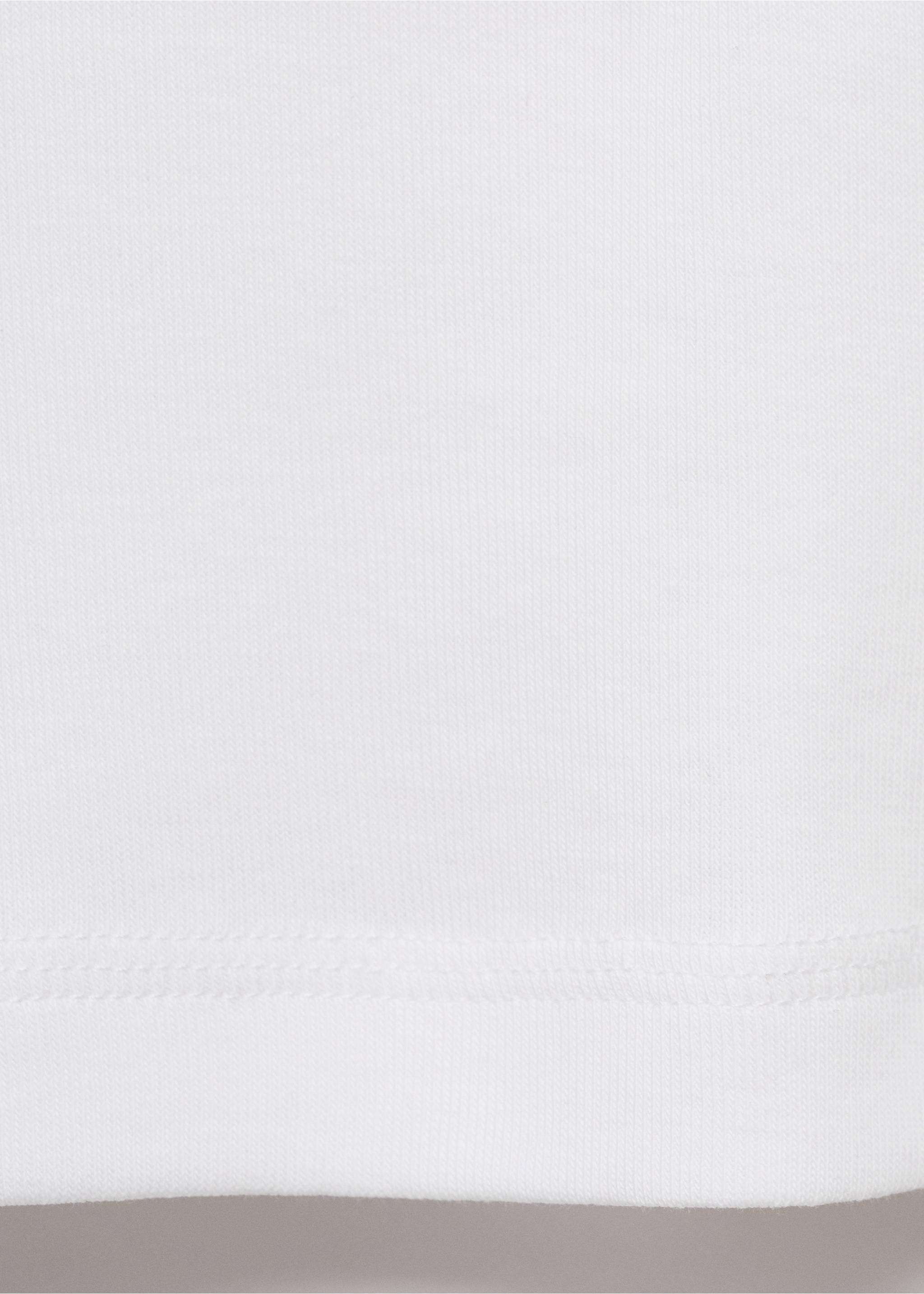 White t-shirt detail showing fabric texture and hem., White. Ref: 17055814-00.