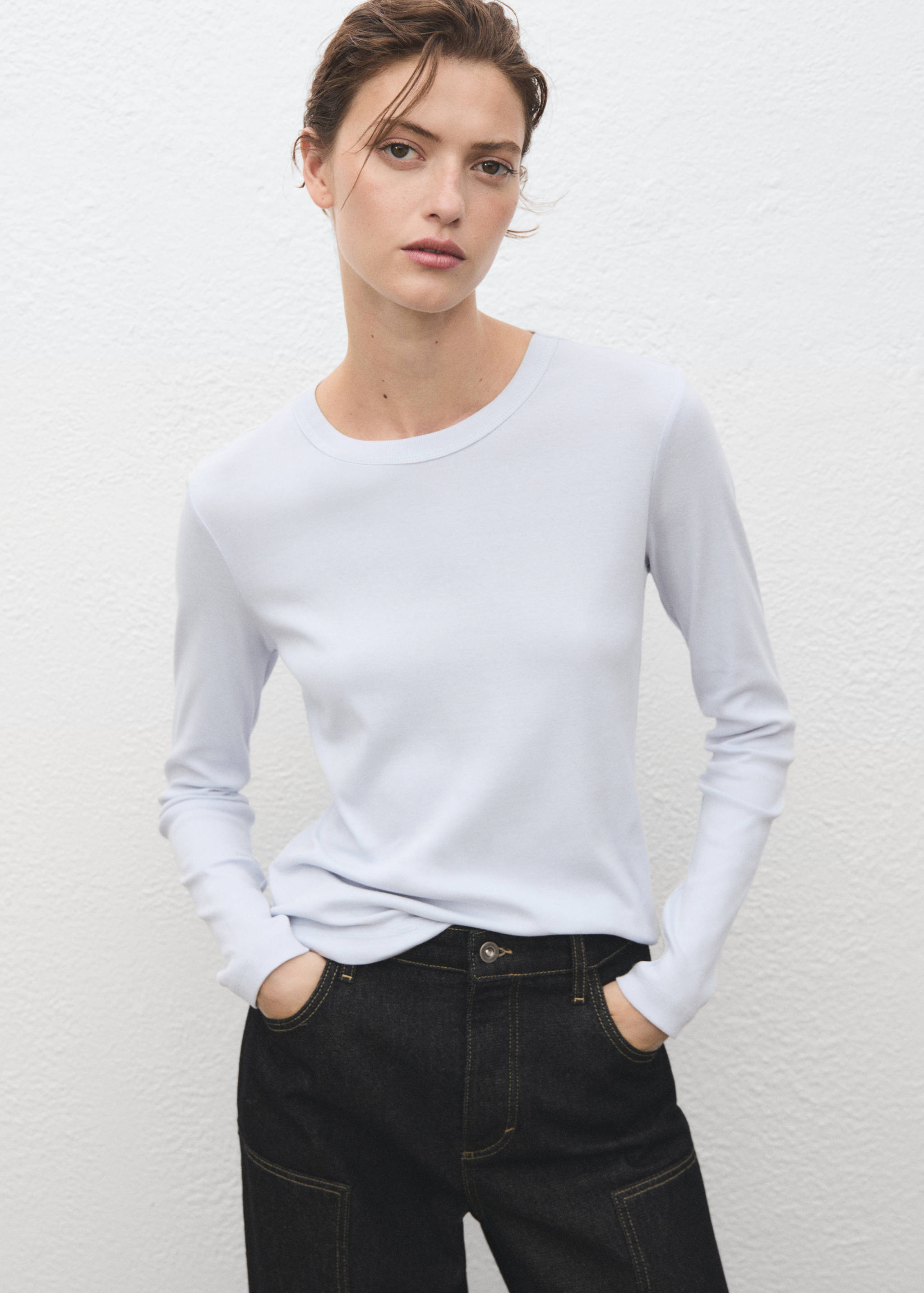 Light blue long-sleeve t-shirt with a crew neck and fitted silhouette.