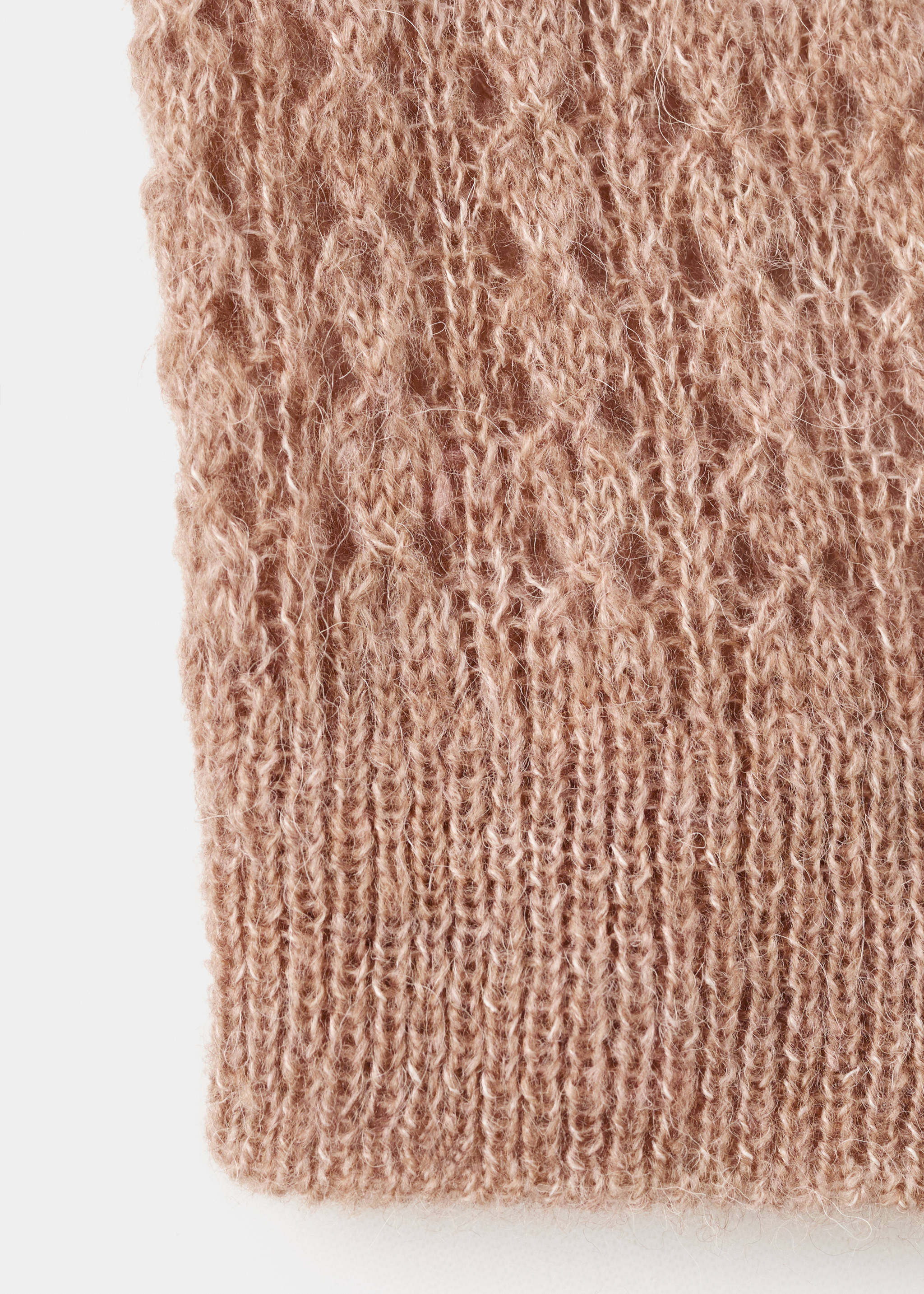 Pink polo knit fabric texture close-up