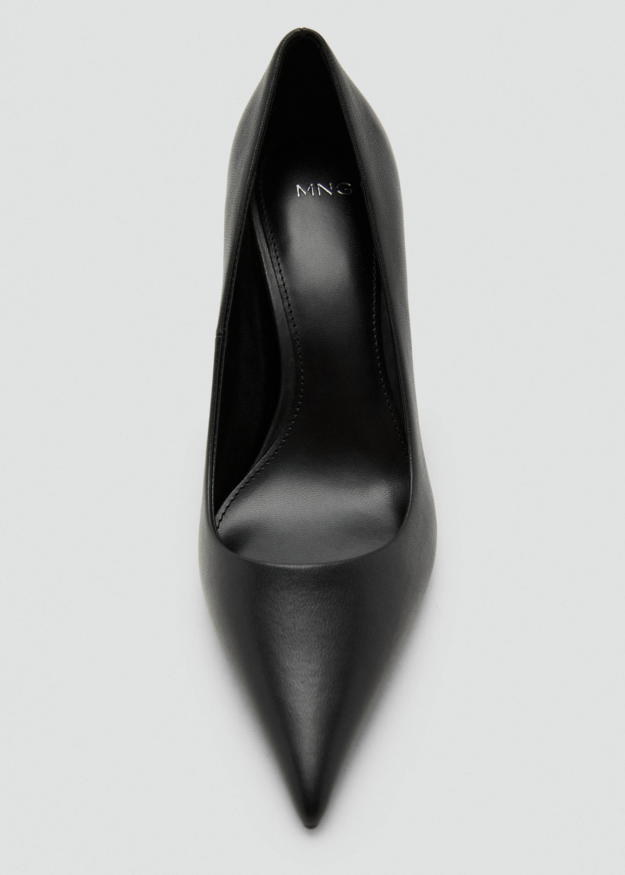 Black pointed-toe high-heeled shoe.