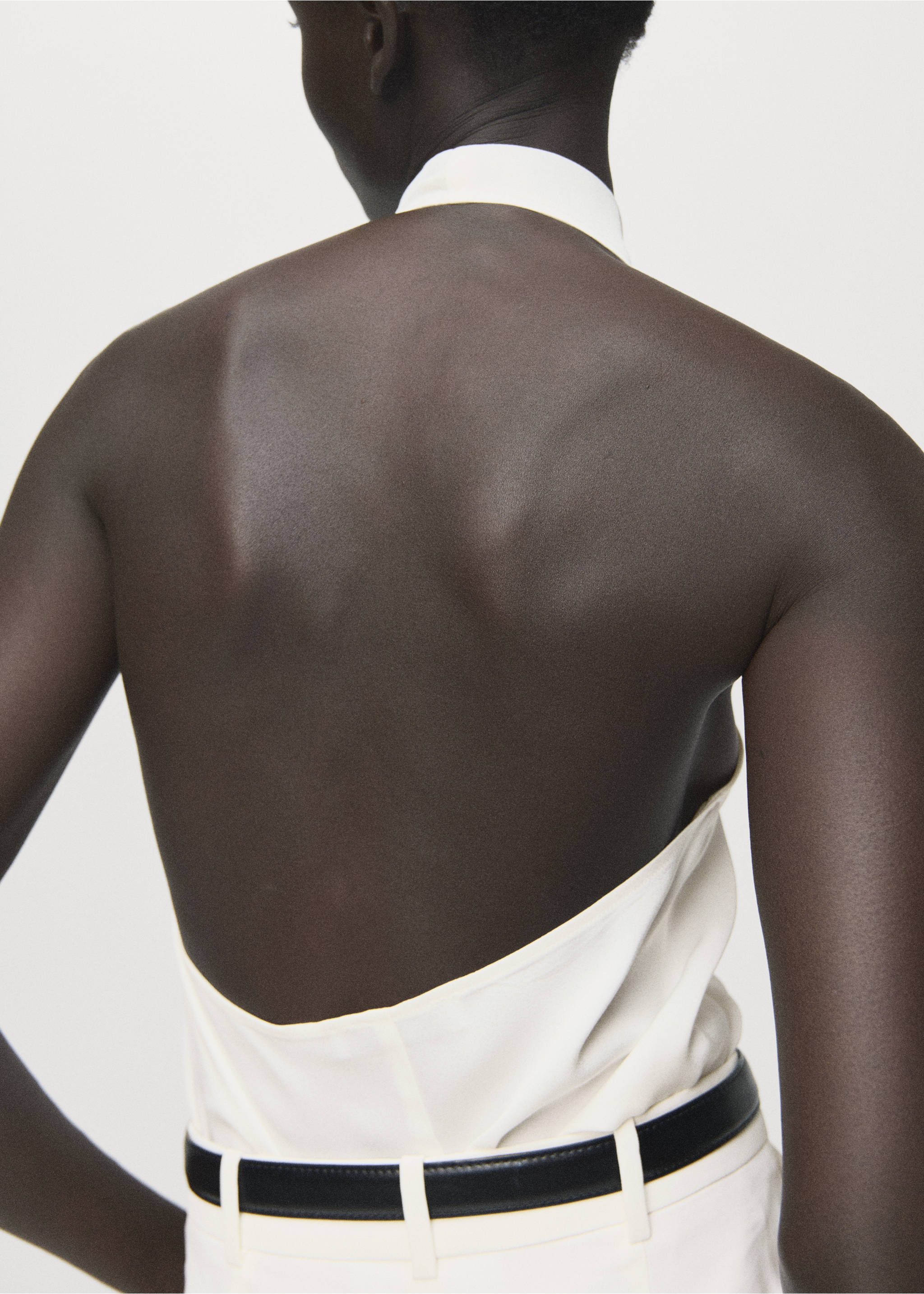 White halter-neck blouse with an open back, seen from behind., Ecru. Ref: 17057803-00.