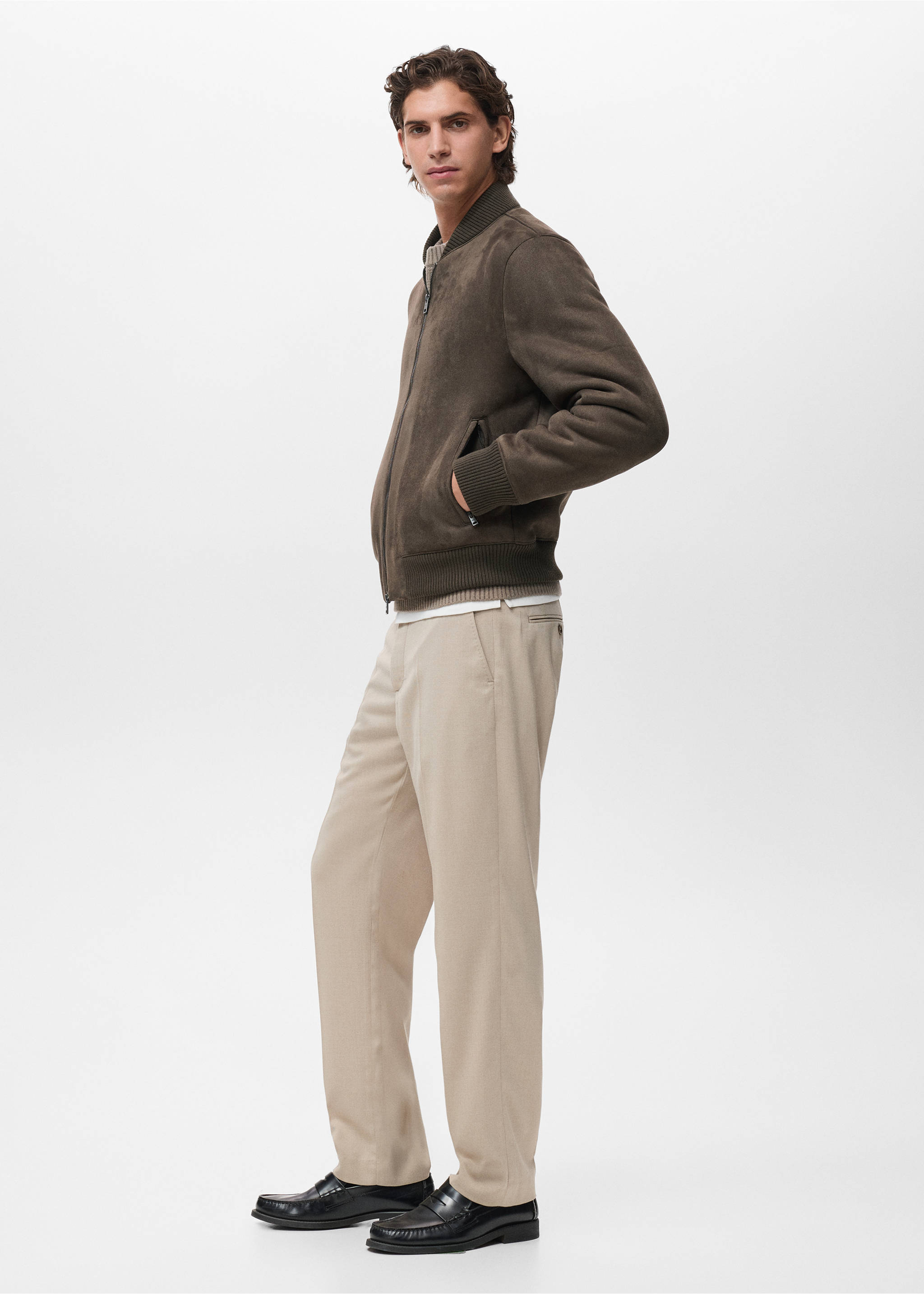Brown bomber jacket with ribbed knit trim worn with beige trousers., Brown. Ref: 17057884-00.