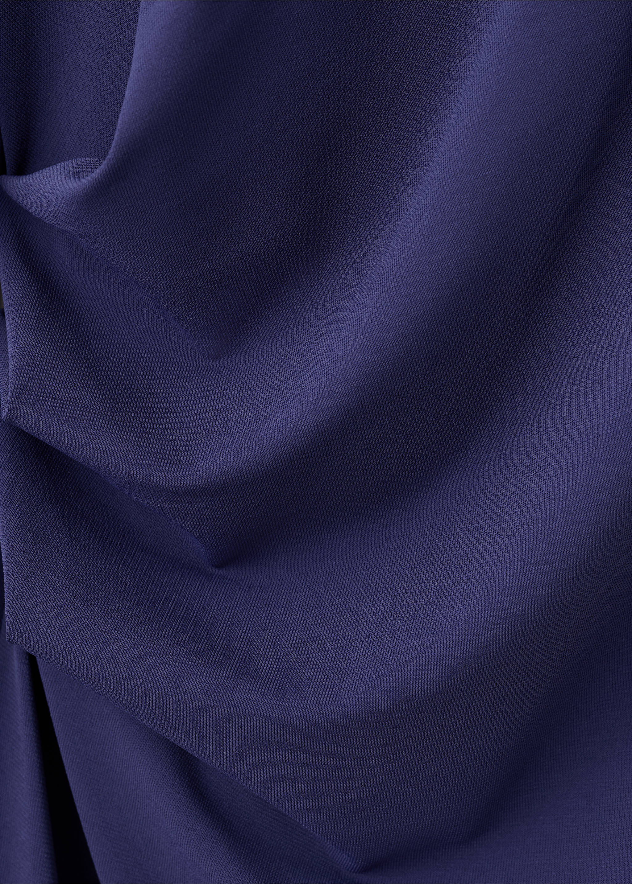 Close-up of the dark purple fabric and draping of a dress., Blue. Ref: 17059118-00.