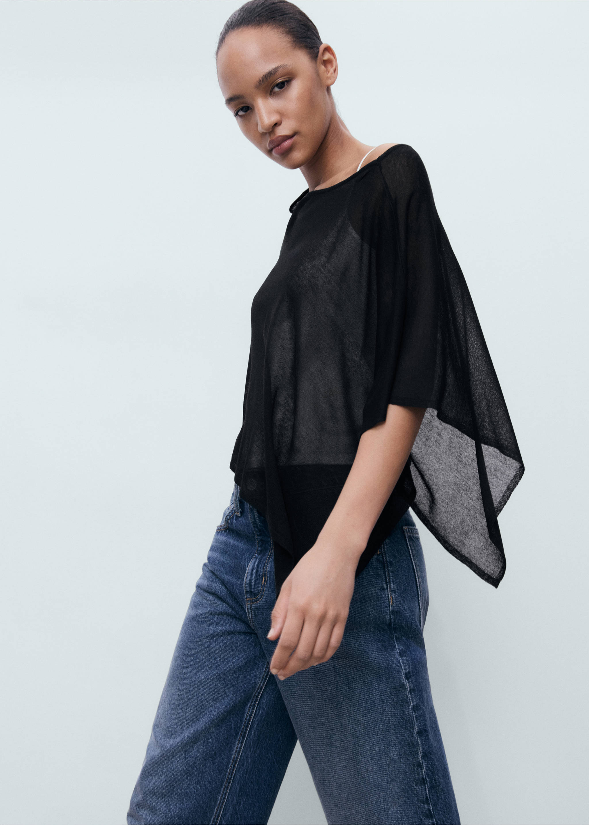 Asymmetrical knitted cape - Details of the article 2, Black. Ref: 17061188-00.