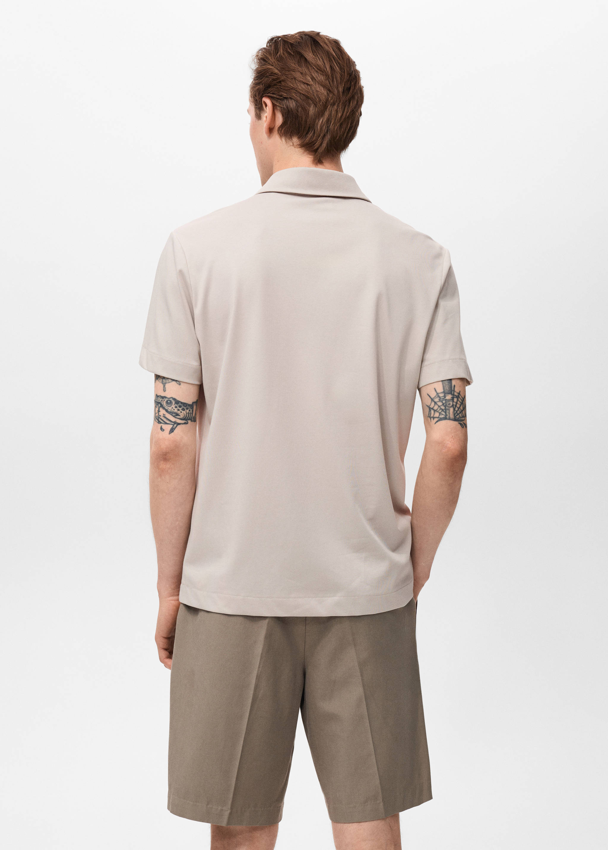 Polo col zippé - Verso de l’article
