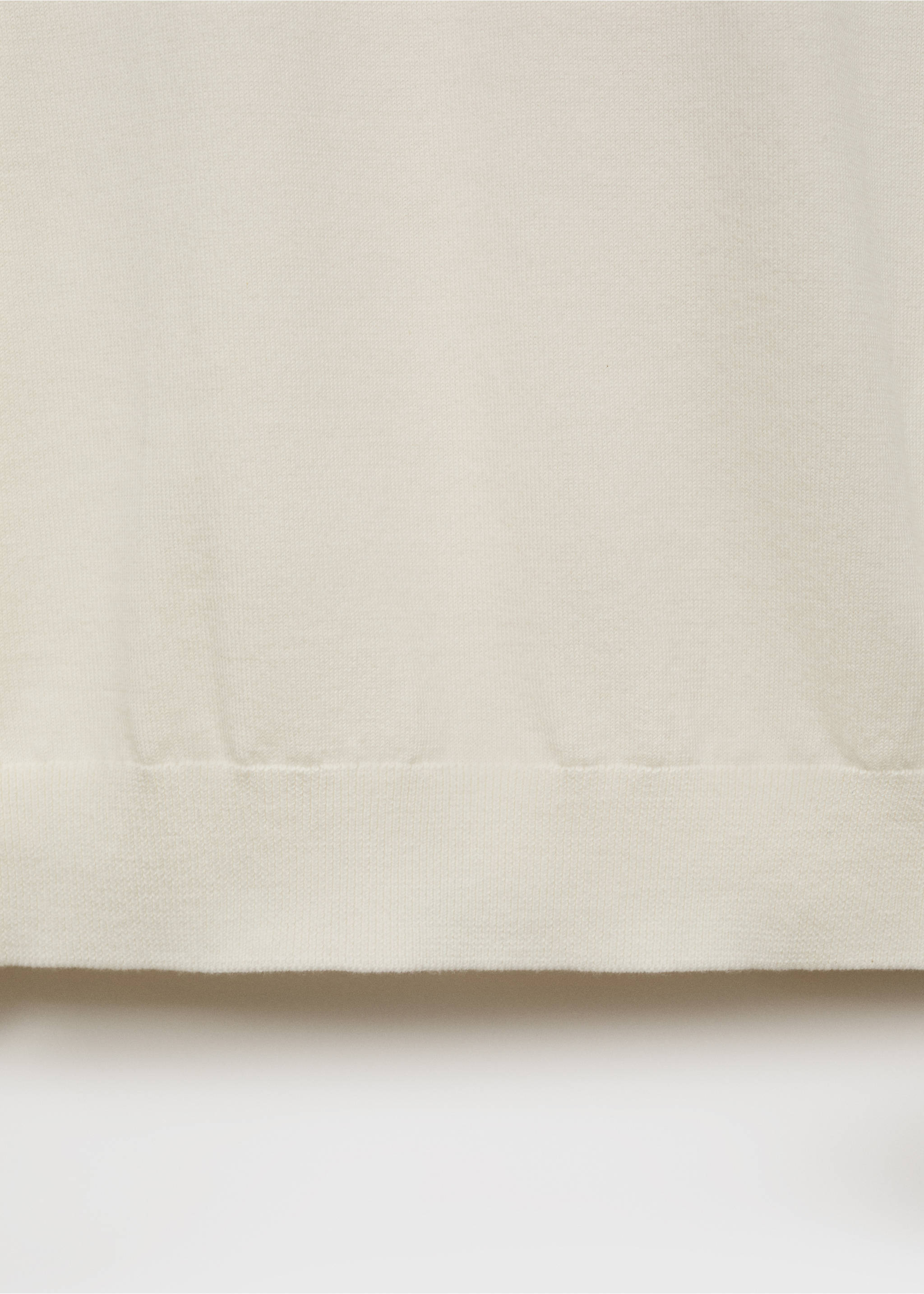 Close-up of off-white fine-knit t-shirt fabric detail., Off White. Ref: 17061245-00.