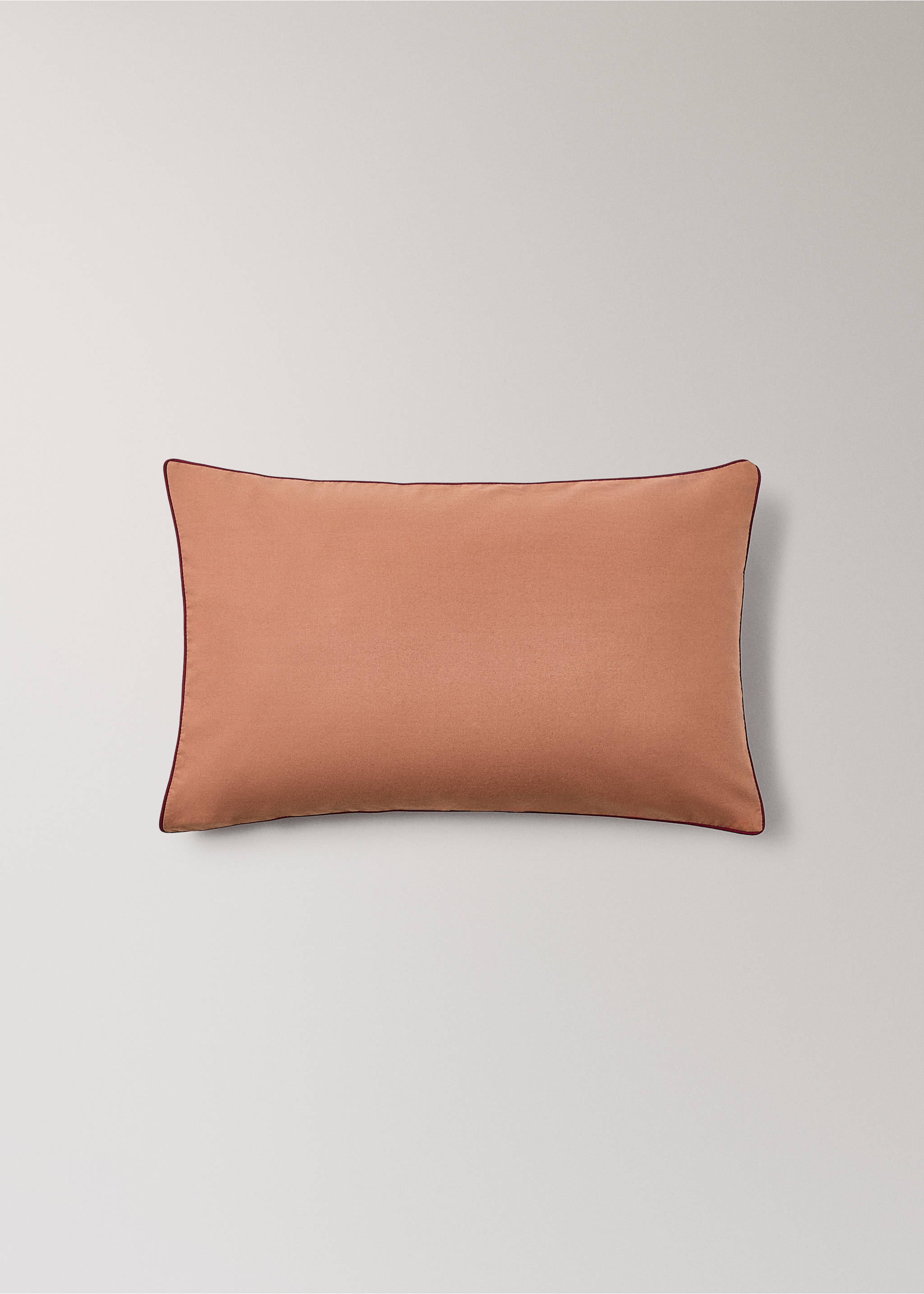 Terracotta orange cot pillowcase with dark burgundy piping., Pink. Ref: 17061545-00.