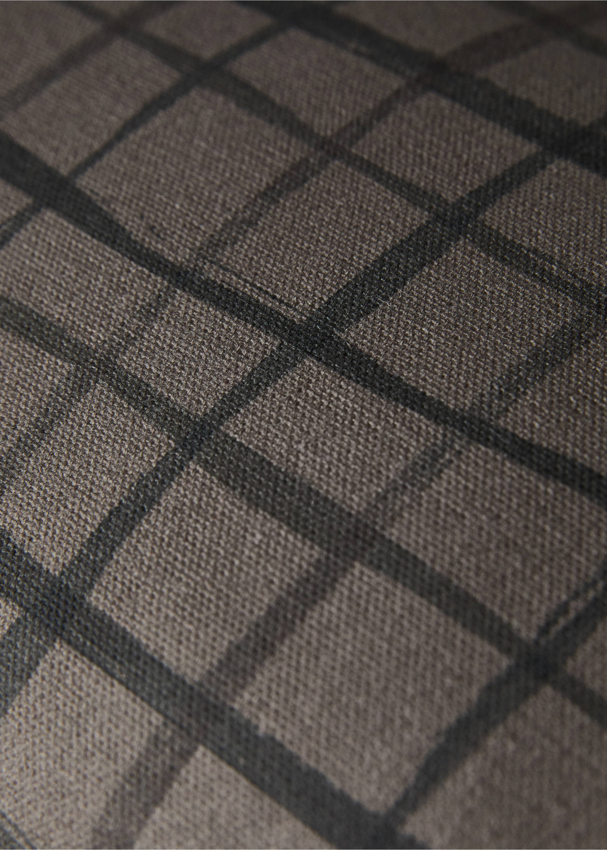 Close-up of a cushion cover with a dark checked pattern., Brown. Ref: 17061580-00.