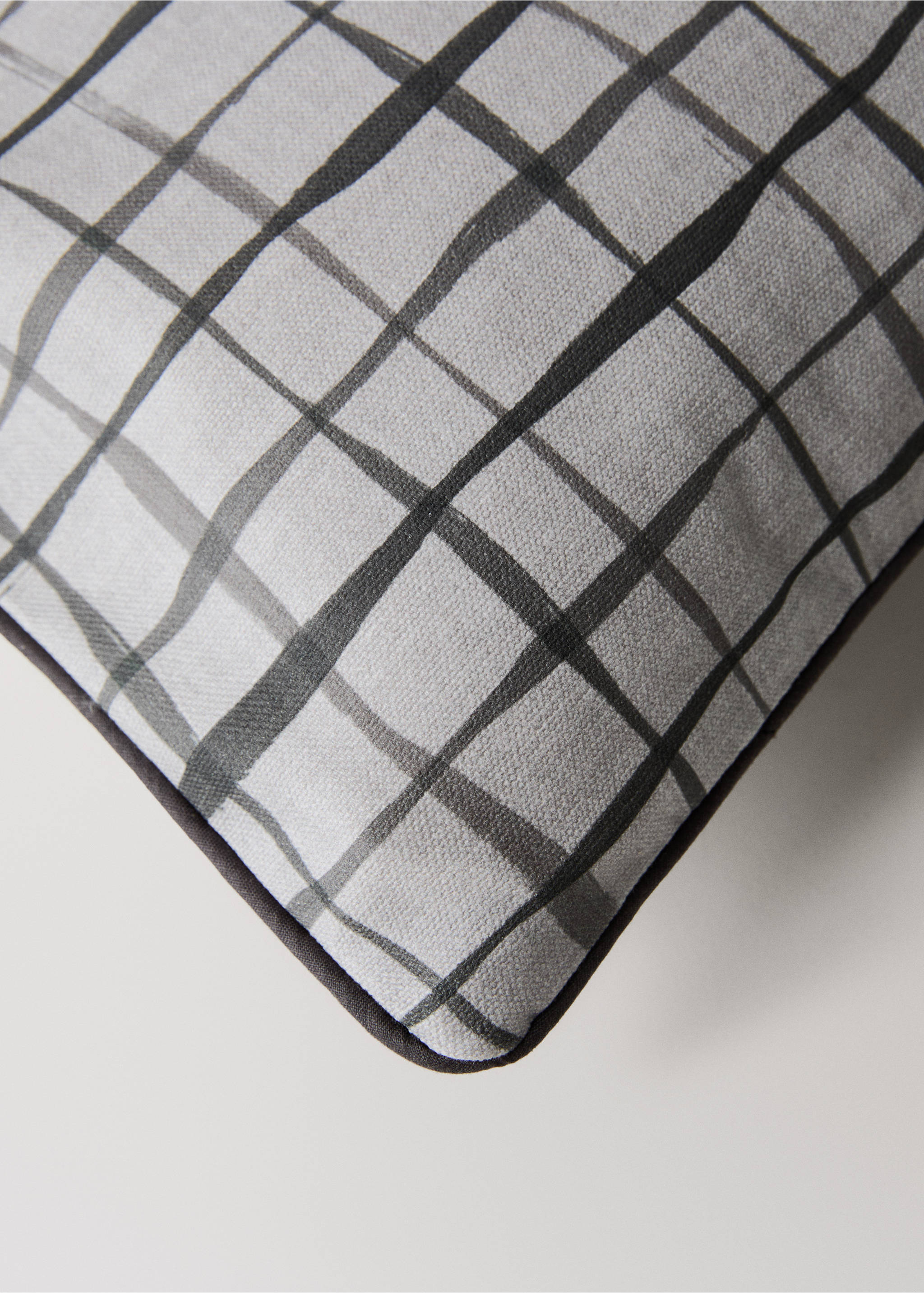 Close-up of a grey checked cushion cover with textured detail., Grey. Ref: 17061580-00.