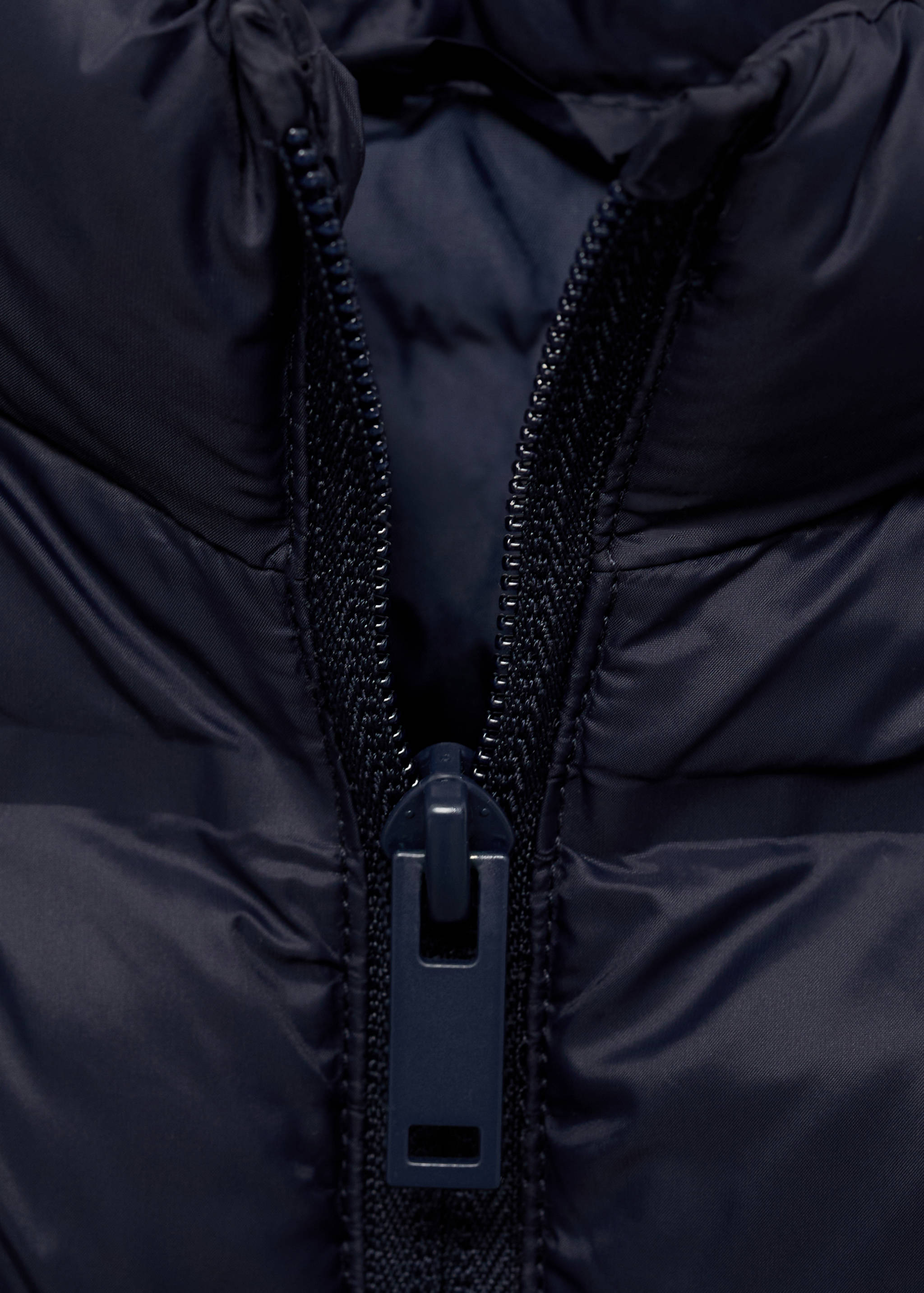 Abric embuatat impermeable - Detall de l'article 8