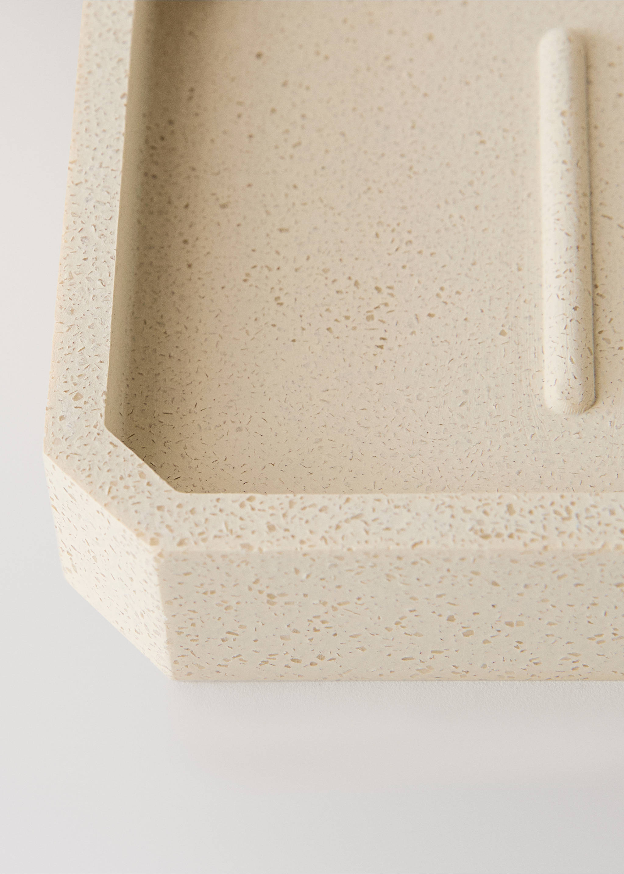 Close-up of a beige speckled soap dish with angled corners., Sand. Ref: 17062919-00.
