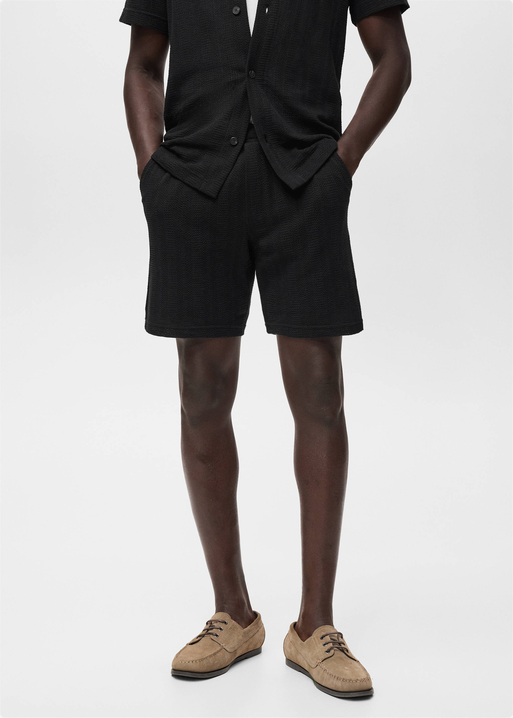 Structured knitted shorts - Medium plane