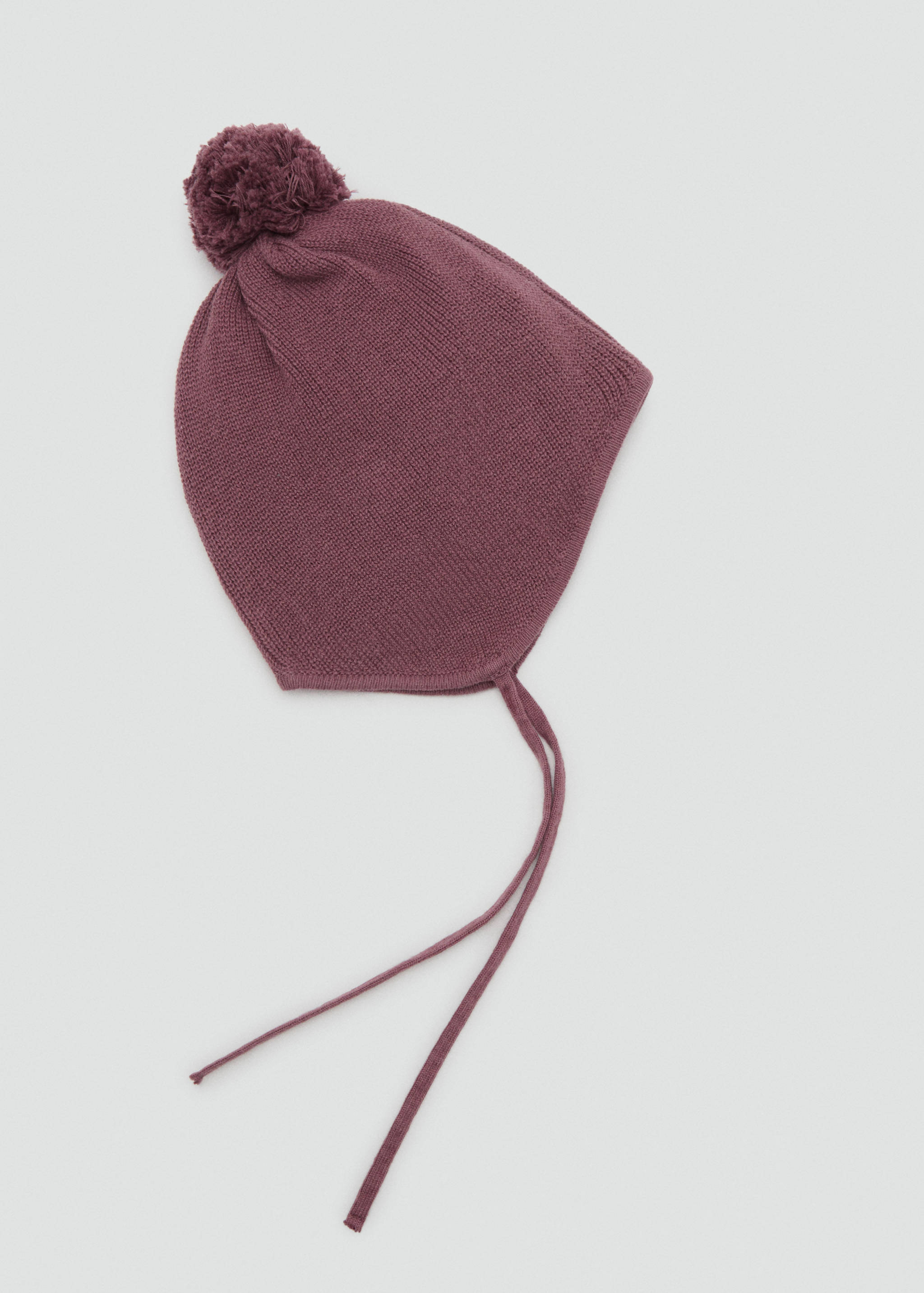 Knitted bonnet with tassel - Article without model