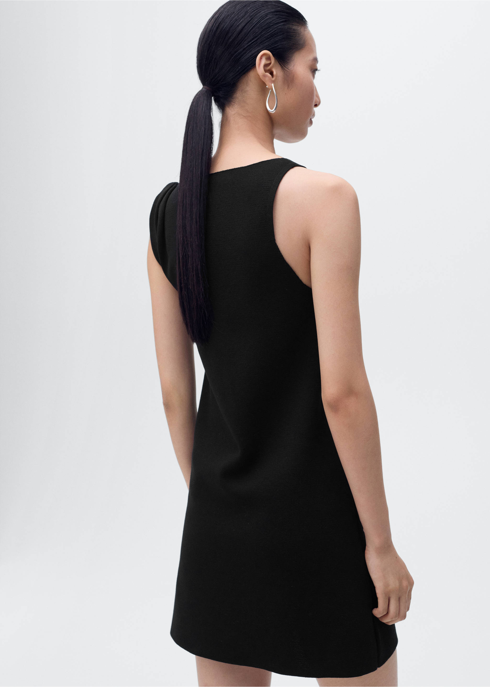 Asymmetrical knitted dress with strap - Reverse of the article, Black. Ref: 17064104-00.