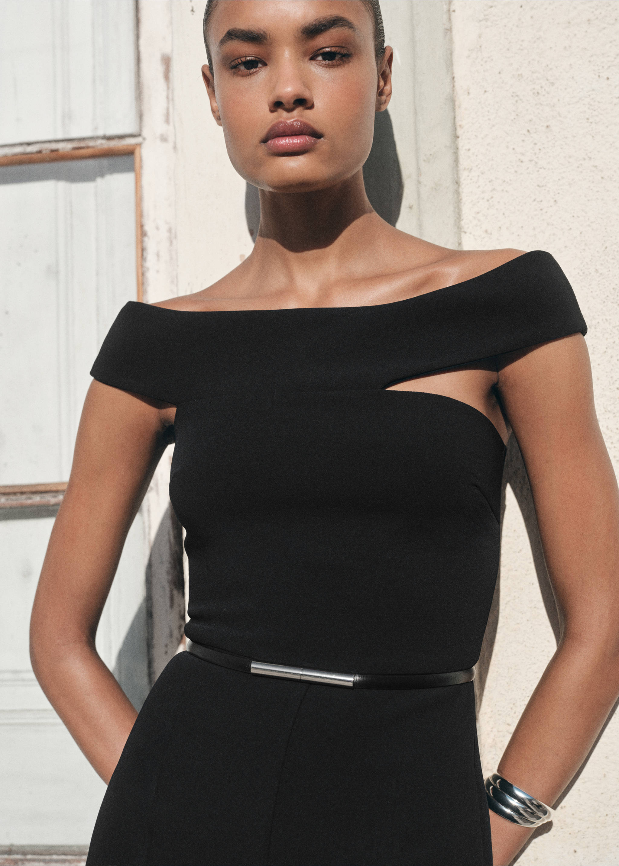 Long jumpsuit with asymmetrical neck - Details of the article 1, Black. Ref: 17064118-00.