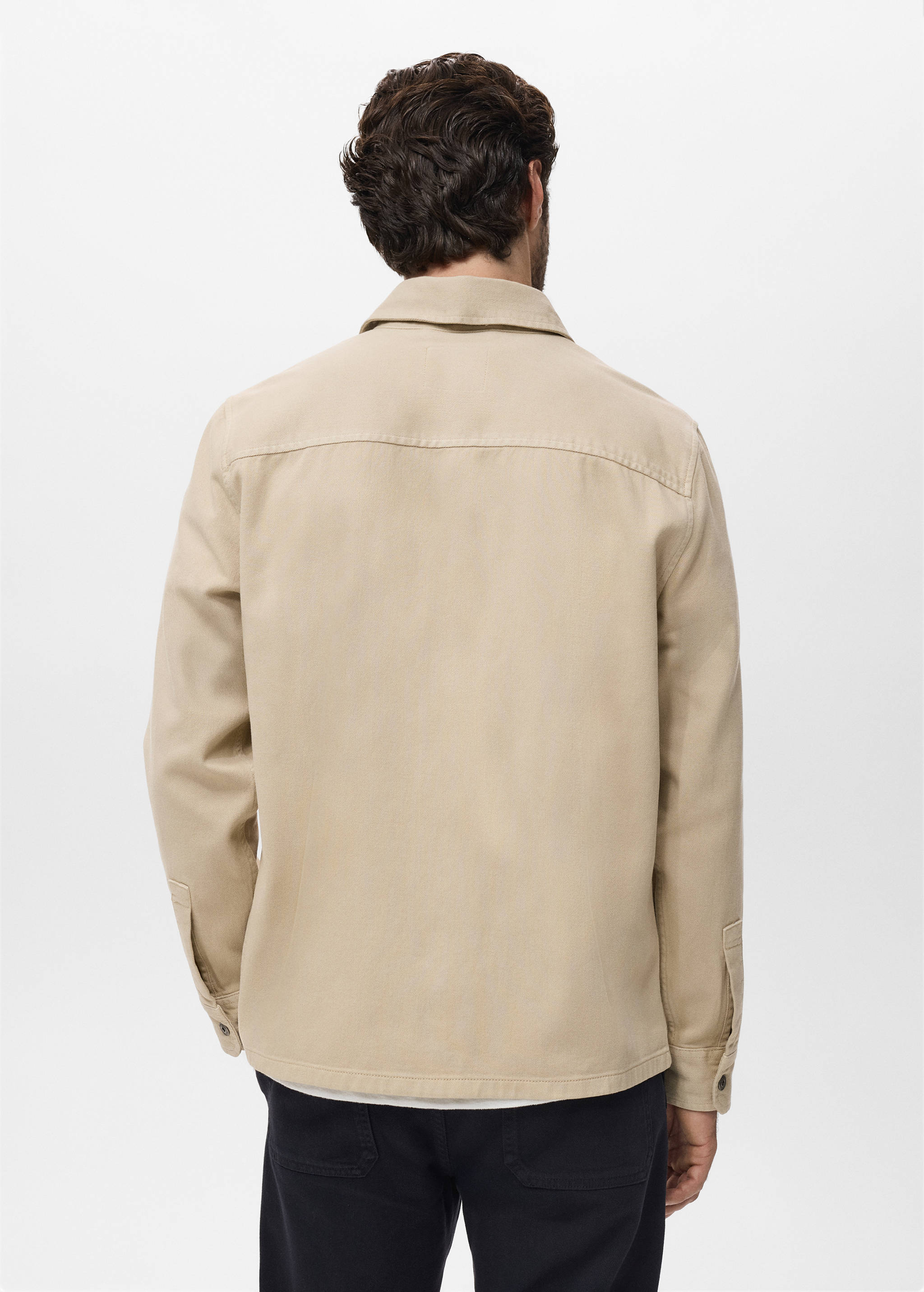 Denim overshirt pockets - Reverse of the article