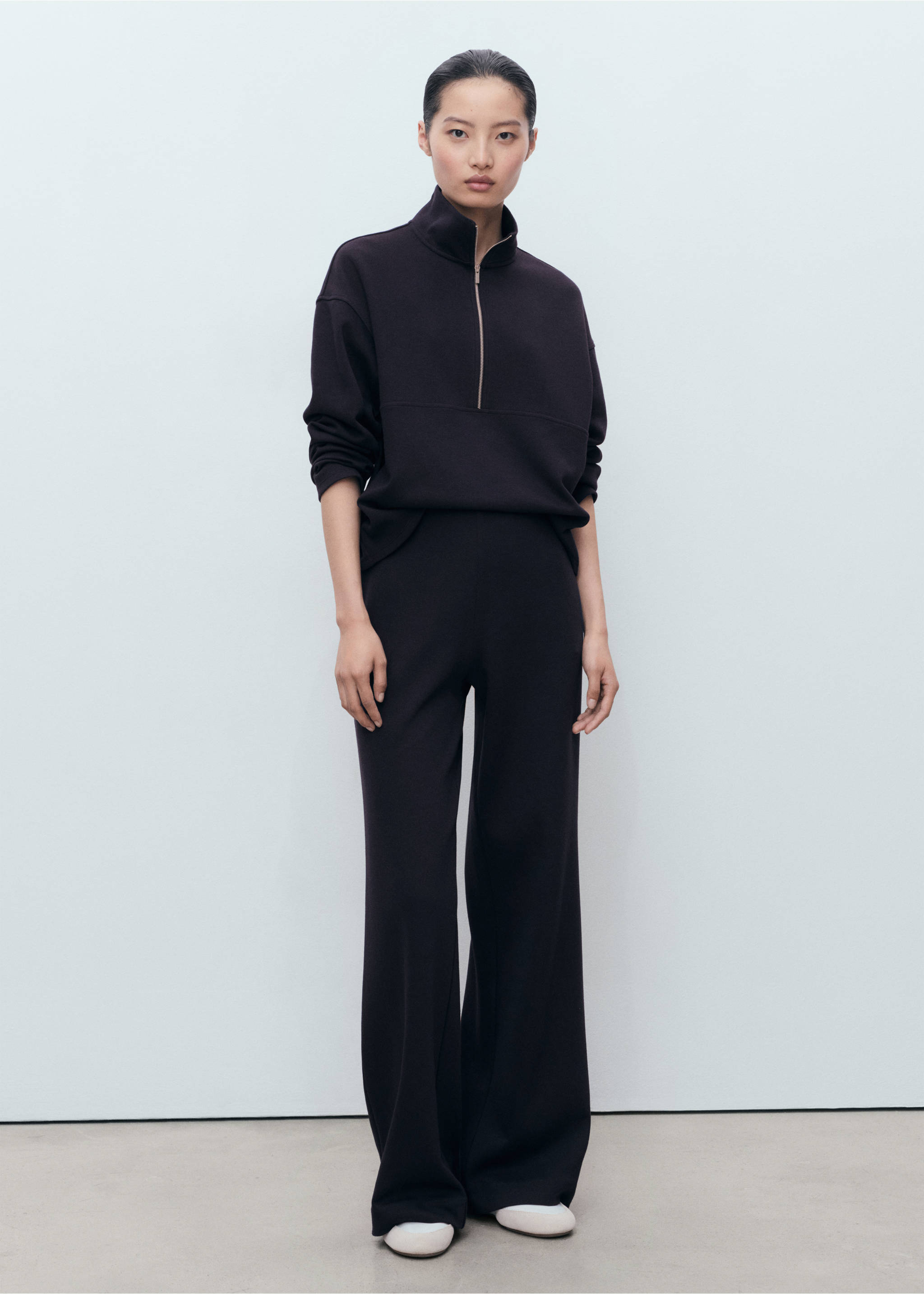 Dark plum wide-leg trousers worn with a matching zip-neck sweatshirt., Navy. Ref: 17065167-00.