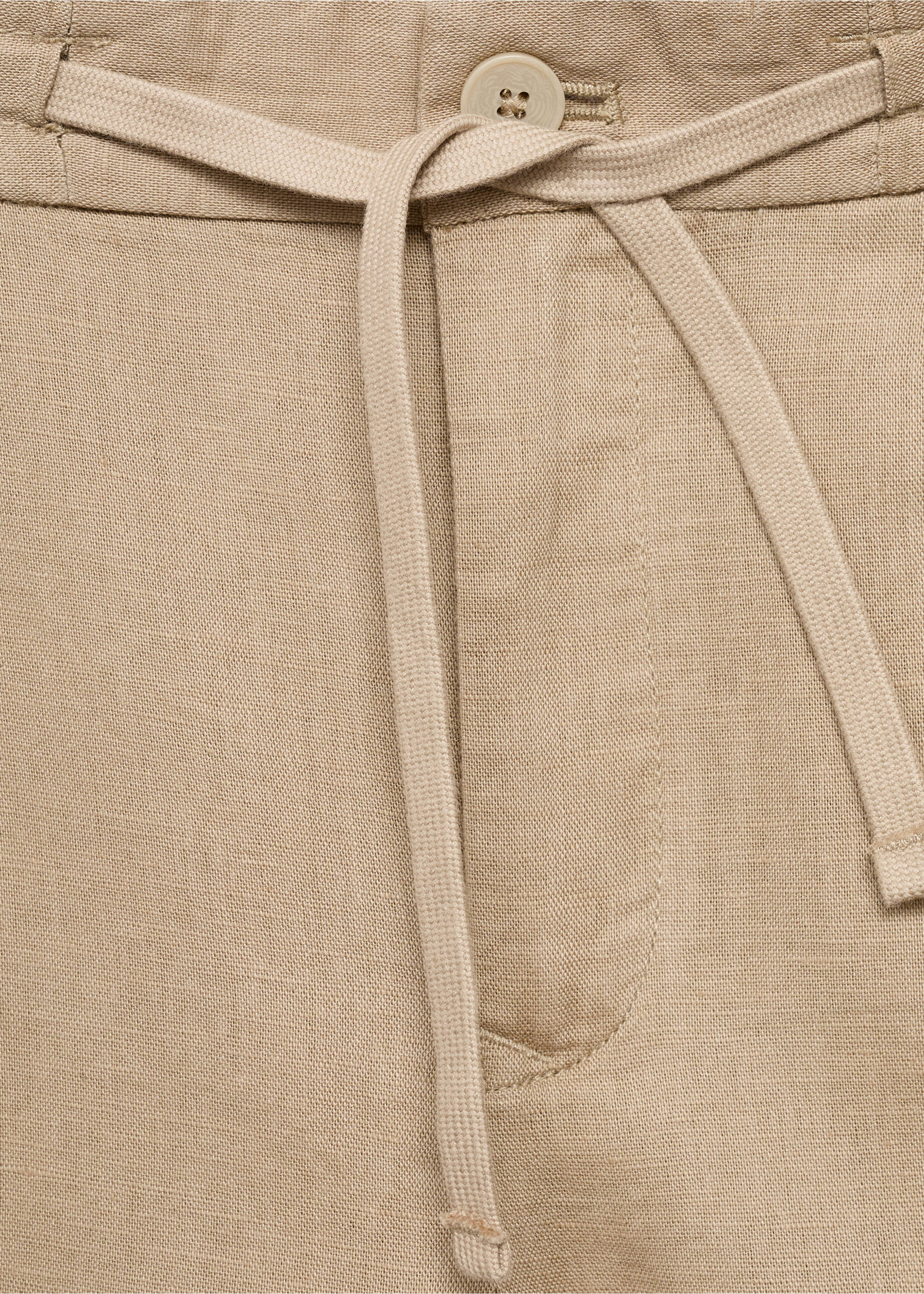 Slim-fit trousers with drawstring - Details of the article 8, Beige. Ref: 17065975-00.