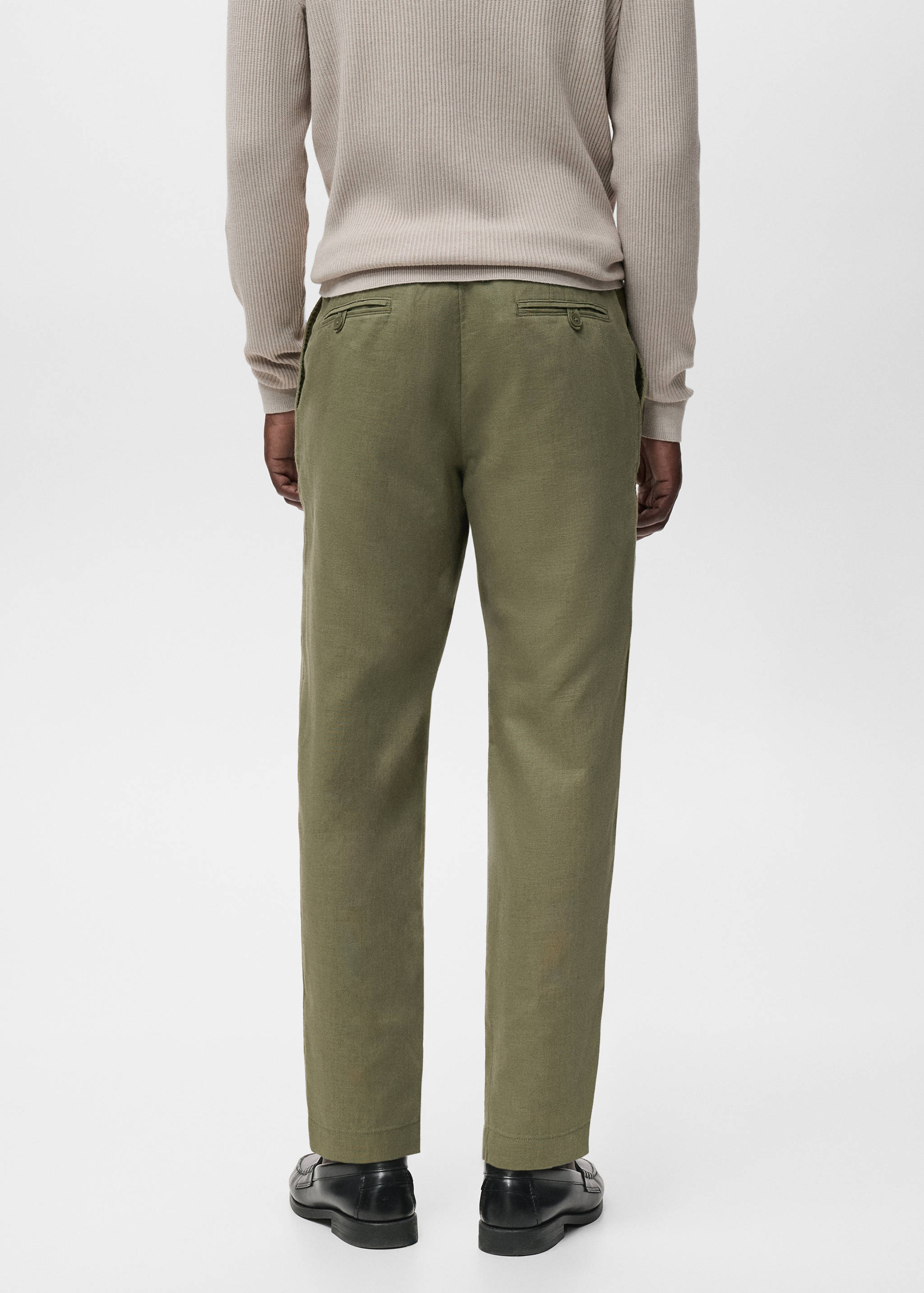 Slim-fit trousers with drawstring - Reverse of the article