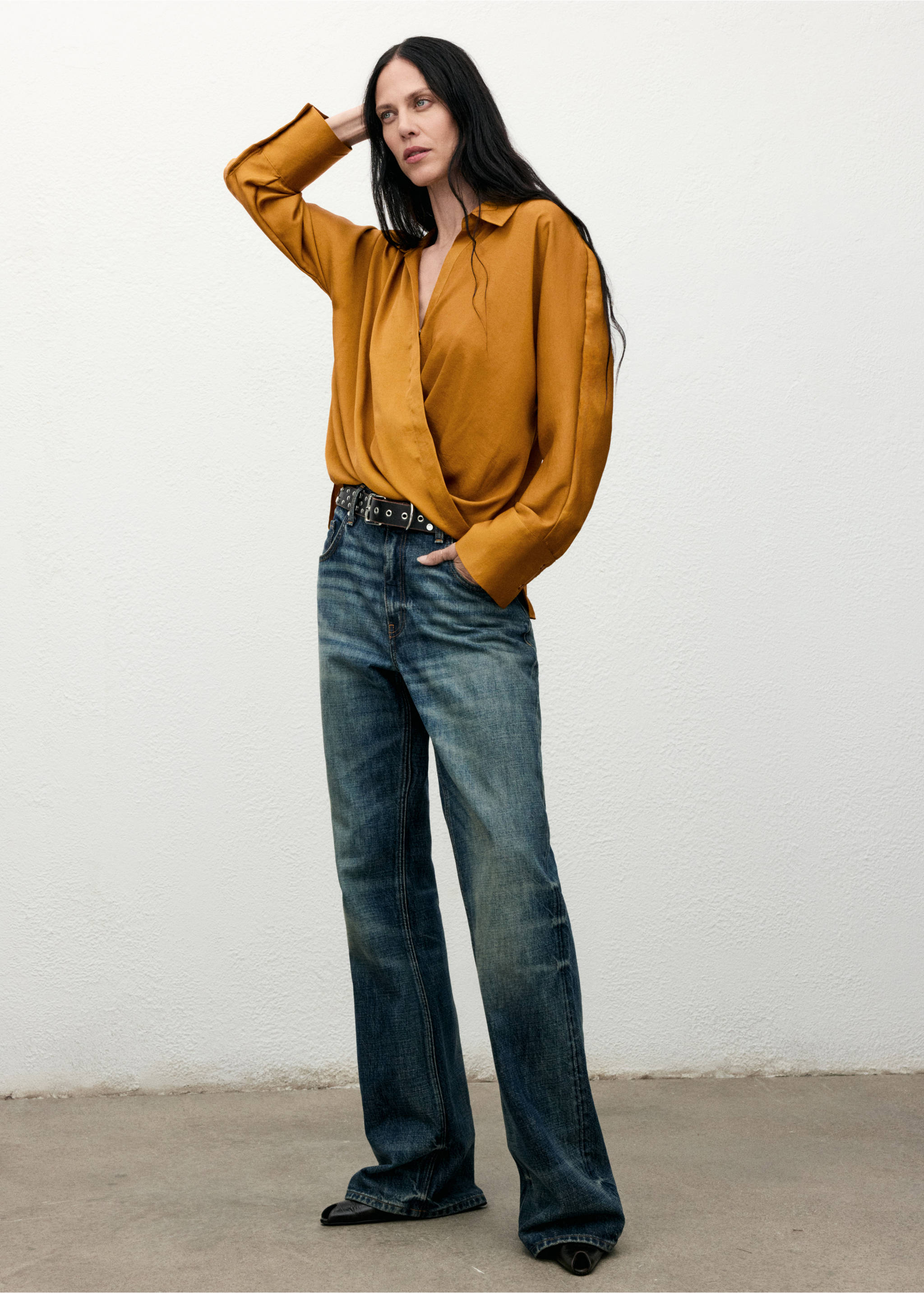 Mustard-yellow satin wrap shirt with long sleeves and a collar, worn with blue trousers., Mustard. Ref: 17067800-00.