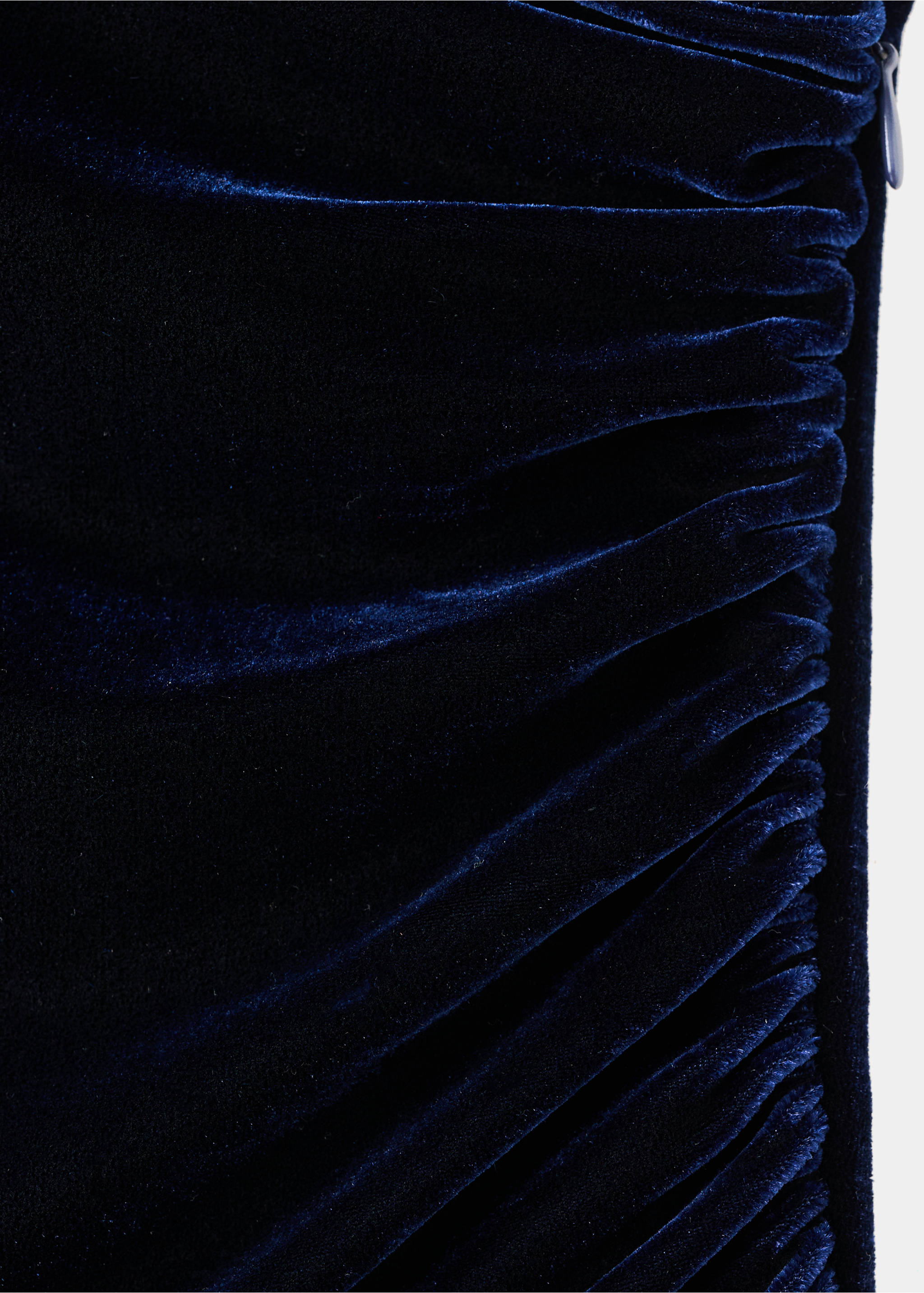 Close-up of the dark blue velvet fabric and ruching detail on a jumpsuit., Navy. Ref: 17067802-00.