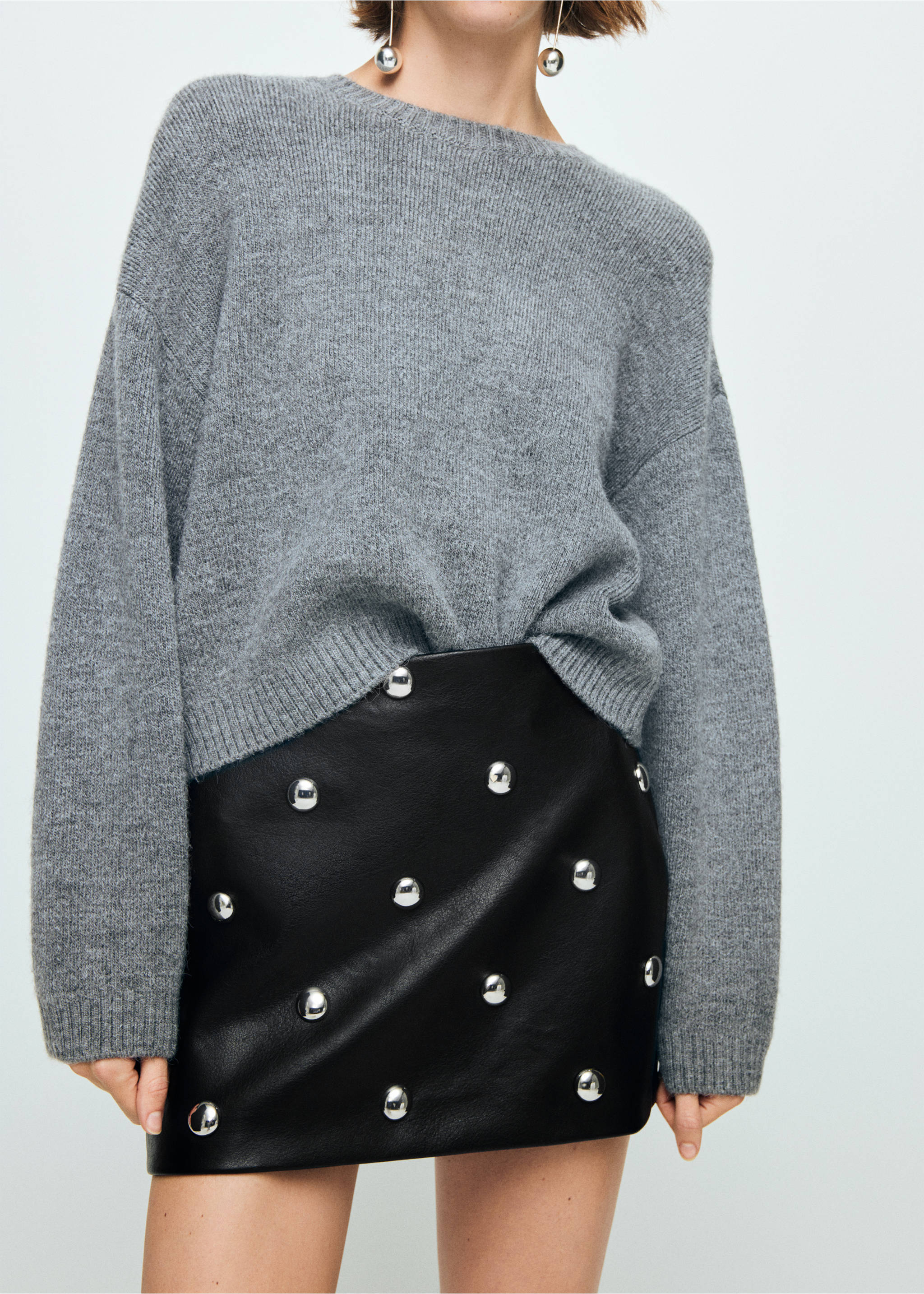 Studded faux-leather skirt - Details of the article 1, Black. Ref: 17069109-00.