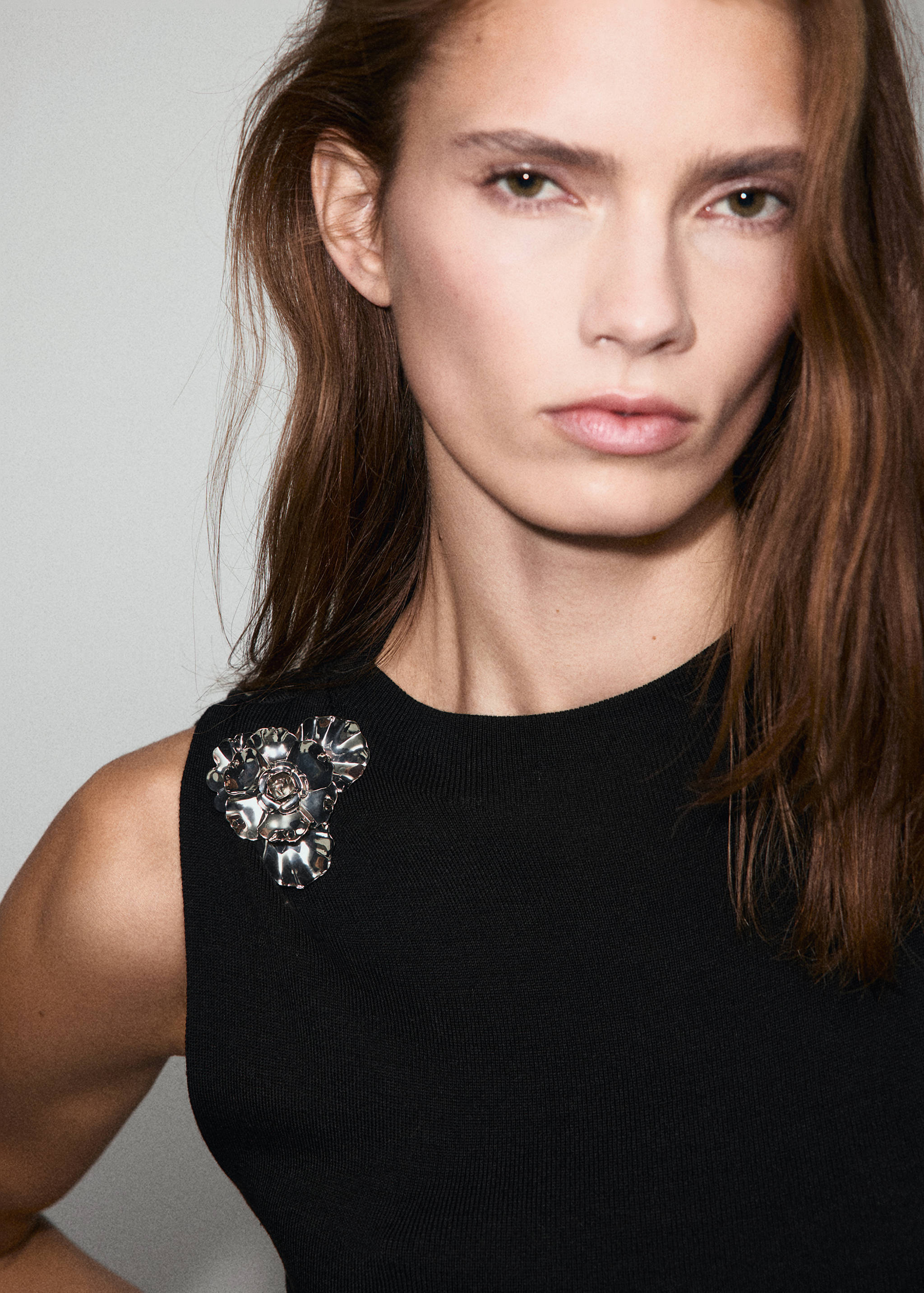 Knitted top with metallic flower - Details of the article 1
