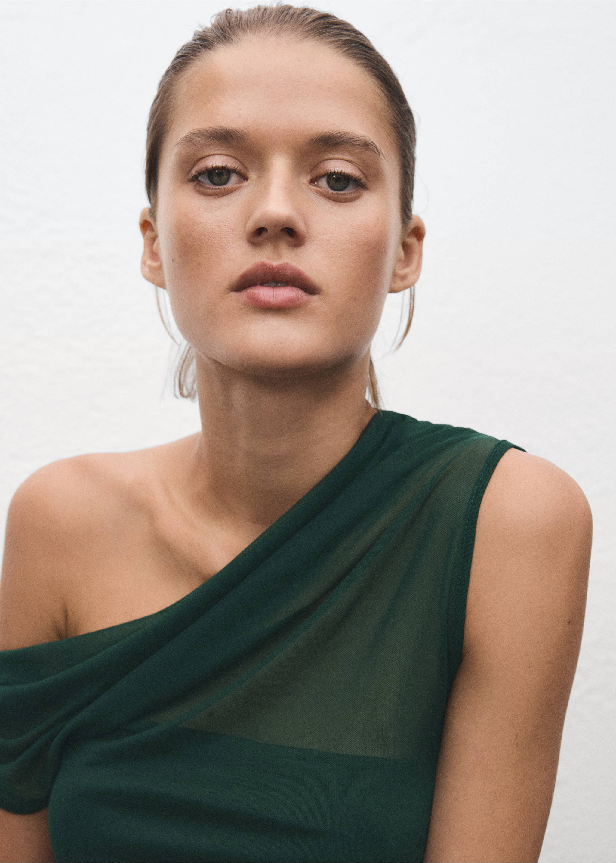 Semi-transparent top with asymmetrical neckline - Details of the article 1, Green. Ref: 17069212-00.
