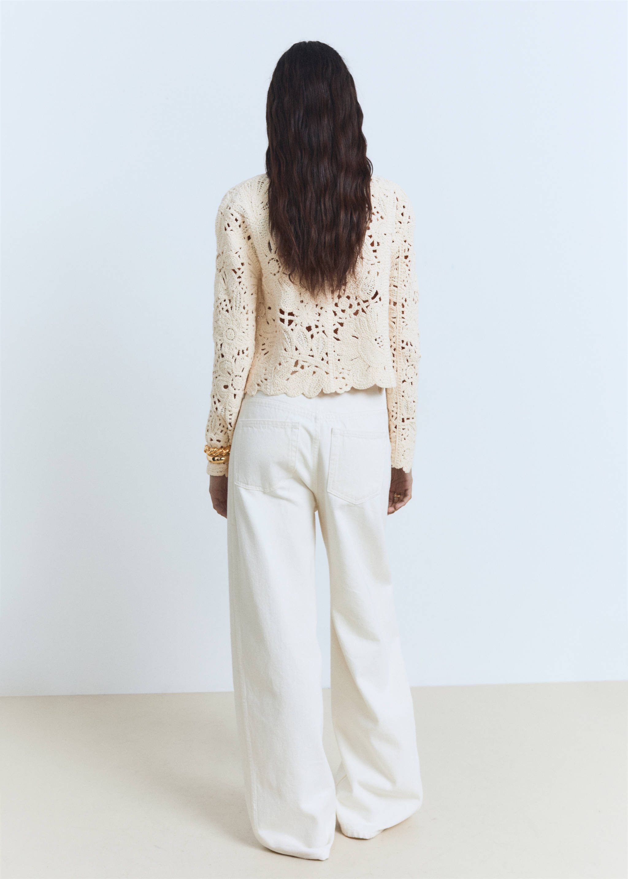 Openwork knitted jacket with scalloped hem - Reverse of the article