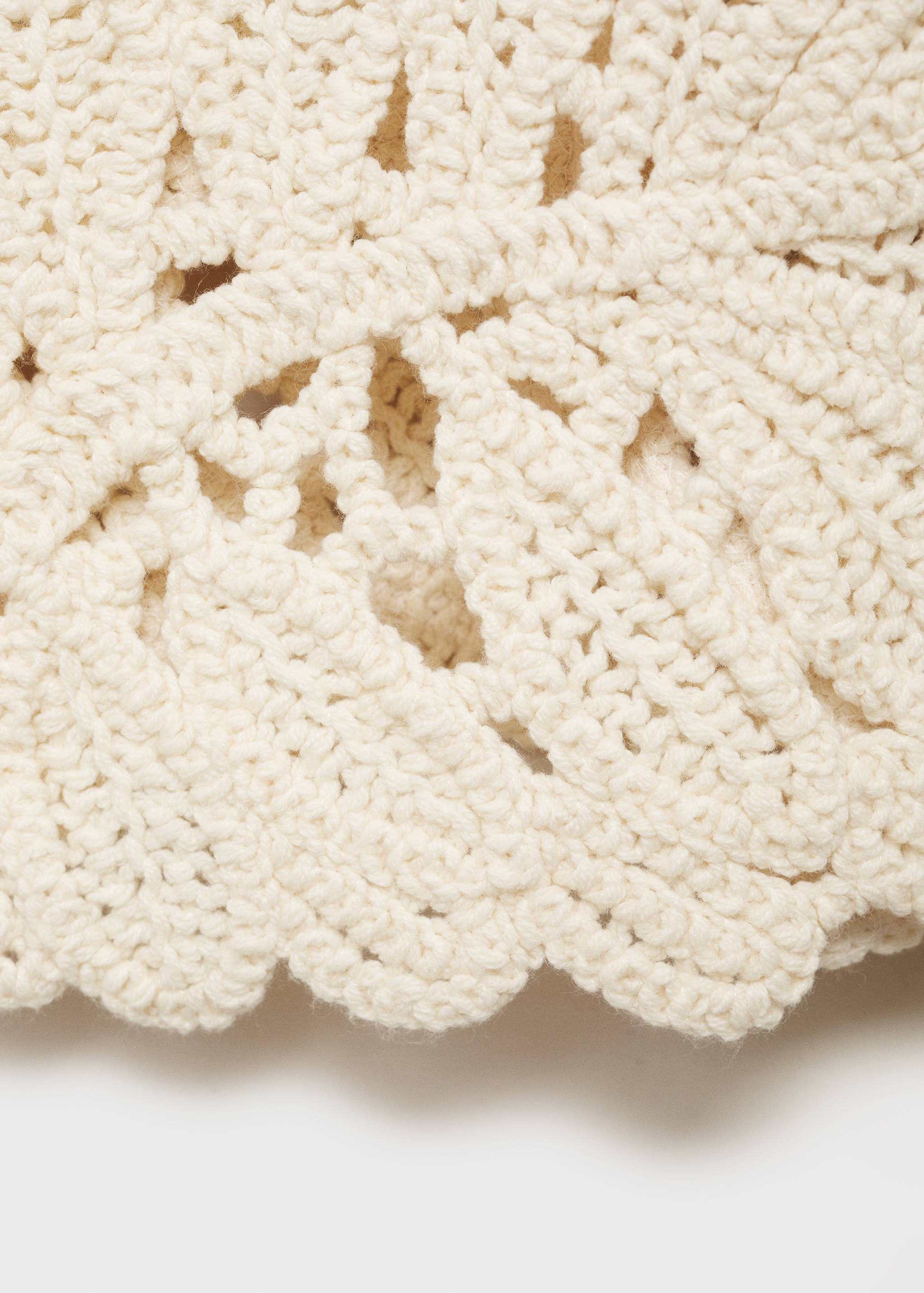 Openwork knitted jacket with scalloped hem - Details of the article 0