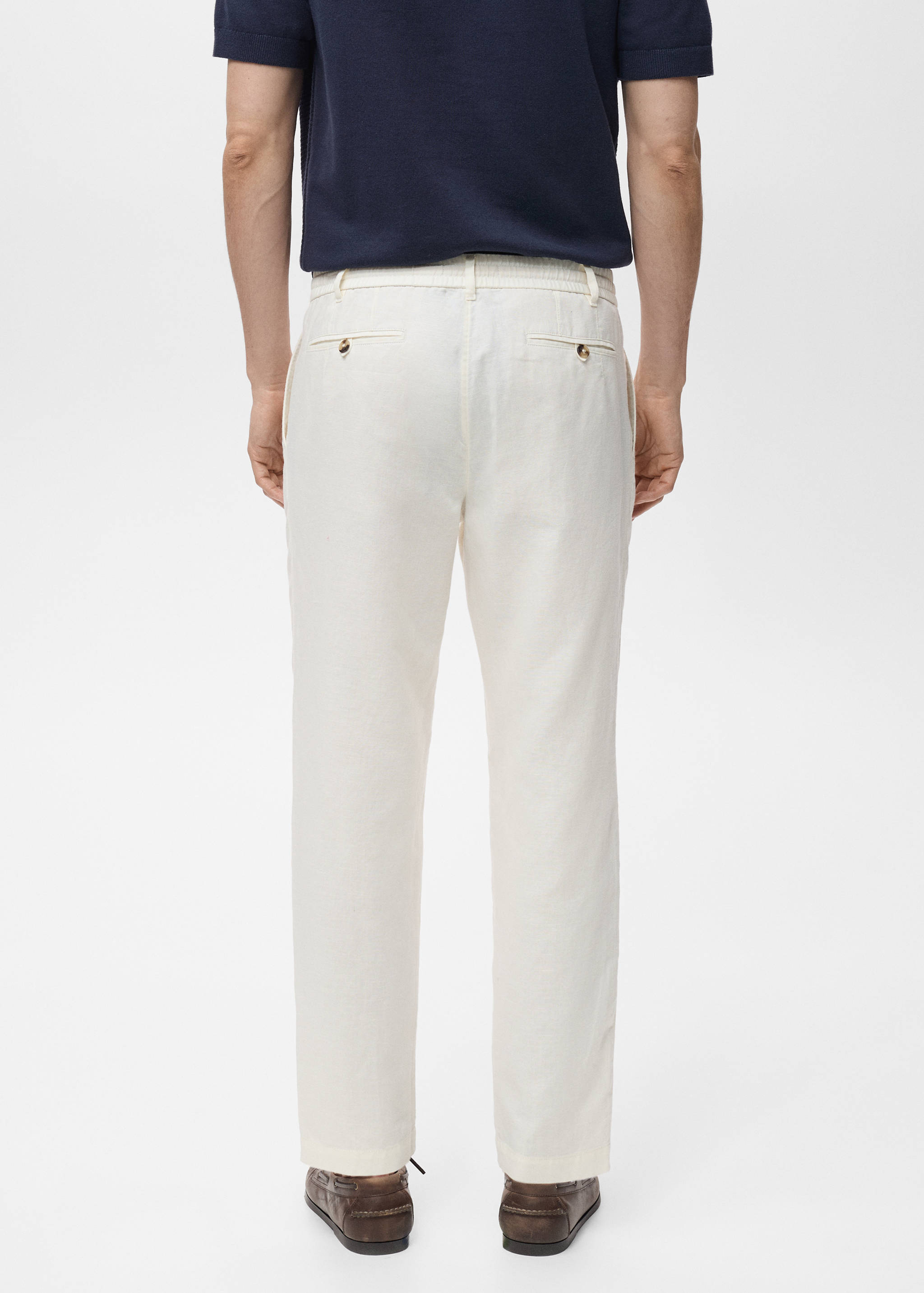Slim-fit trousers with drawstring - Reverse of the article